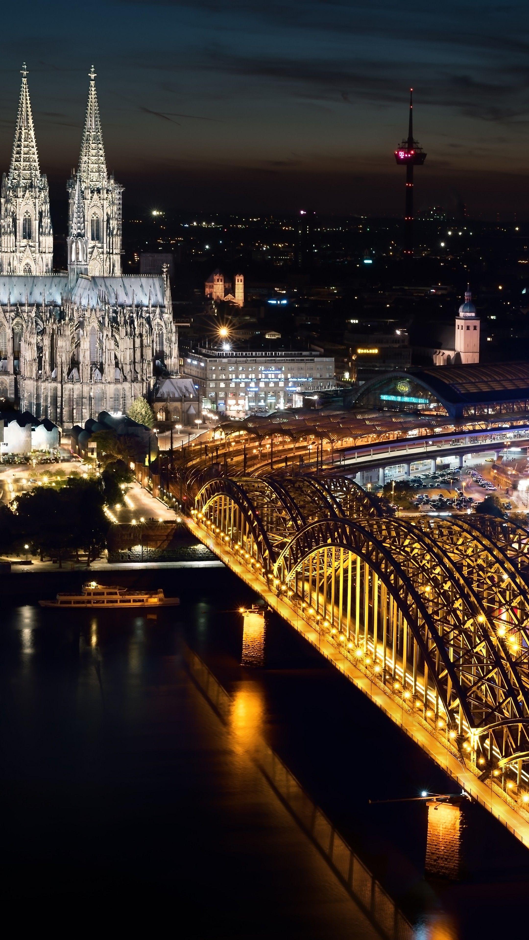 2160x3840 Wallpaper Cologne Cathedral, Hohenzollern bridge, Germany, Cologne, Europe, night, 5k, Architecture