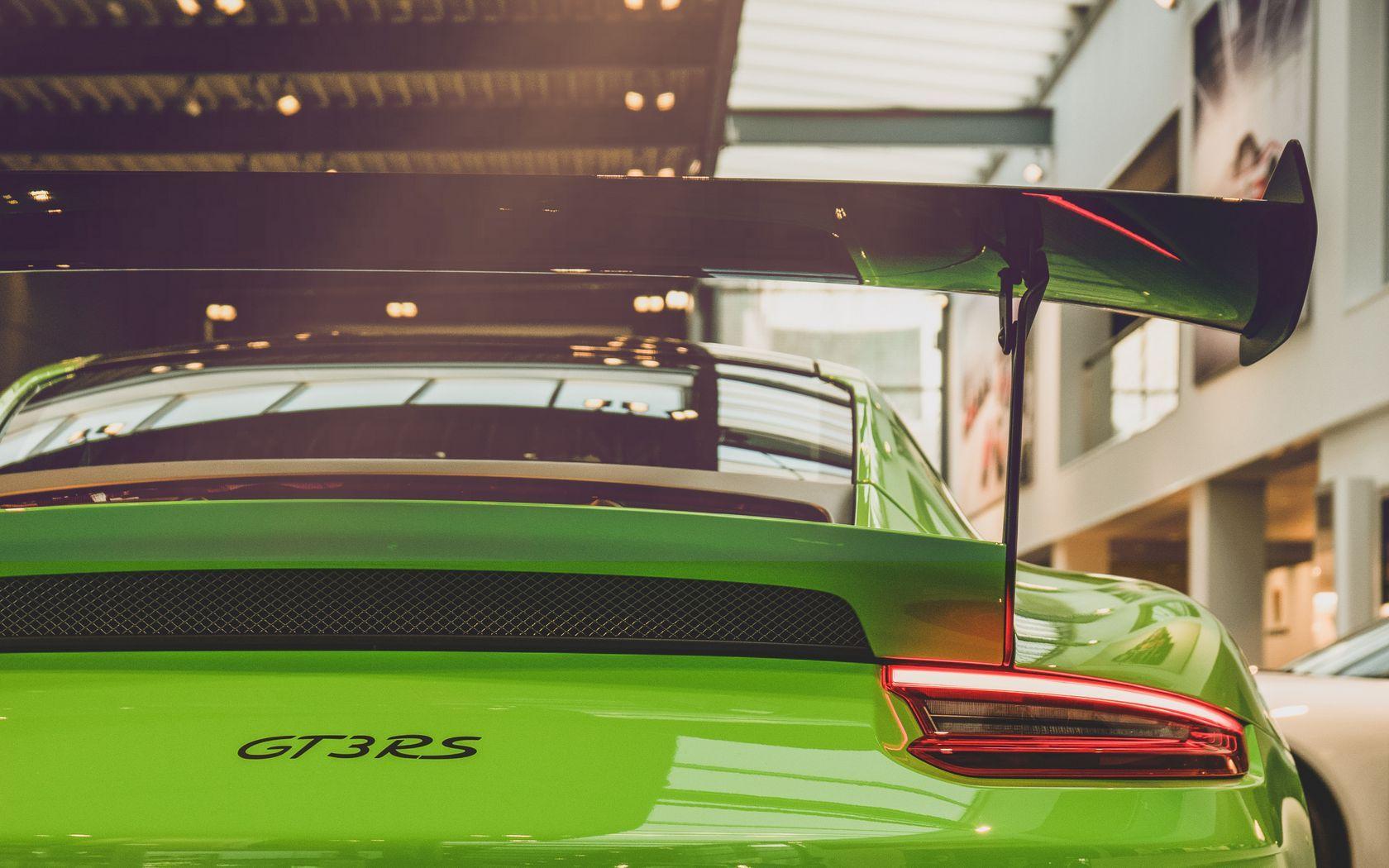 1680x1050 Download wallpaper 1680x1050 porsche 911 gt3 rs, porsche porsche, green, rear view widescreen 16:10 HD background