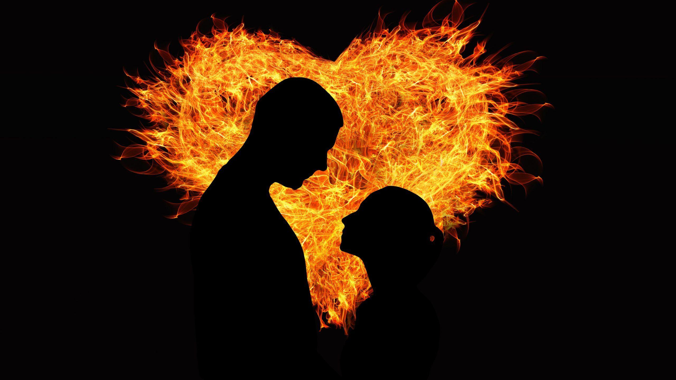 2560x1440 Heart Fire Orange Yellow Couple Love 4K Wallpaper
