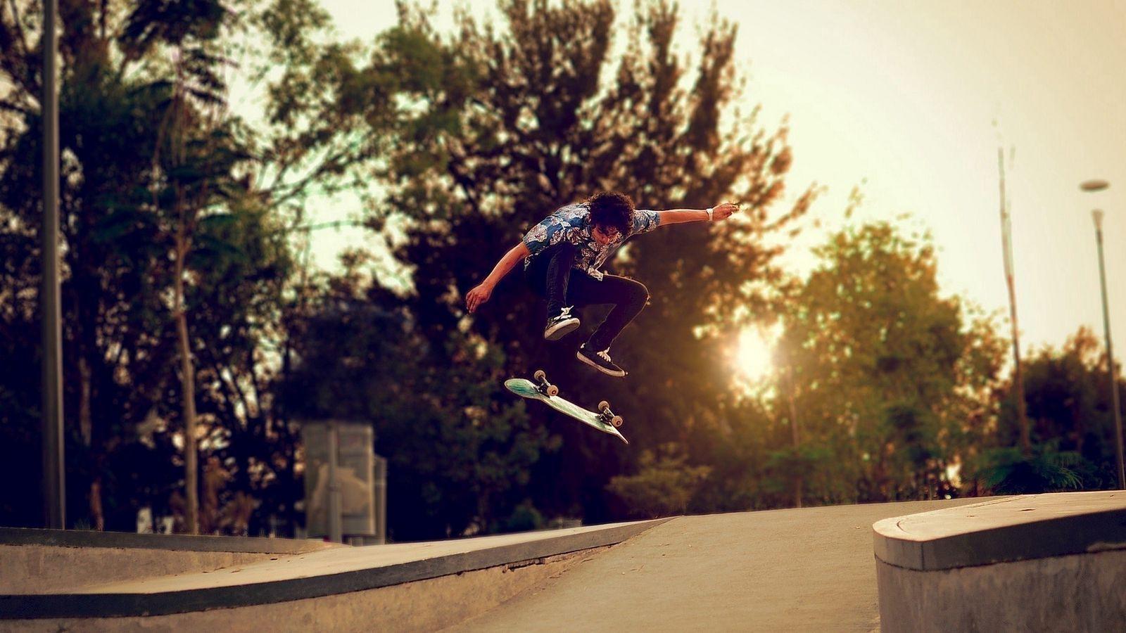 1600x900 Download wallpaper 1600x900 trees, skateboard, boy, skate, street widescreen 16:9 HD background