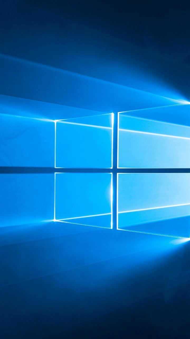720x1280 Windows 10 Logo on Blue Background. How to manage windows features, Windows file management tips