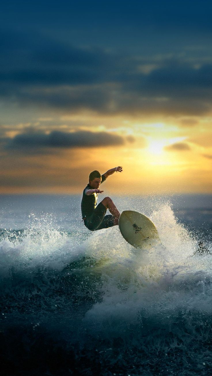 736x1308 Surfing at Sunset: A Thrilling Water Sports Experience. Surfing wallpaper iphone, Surfing background iphone, Surfing