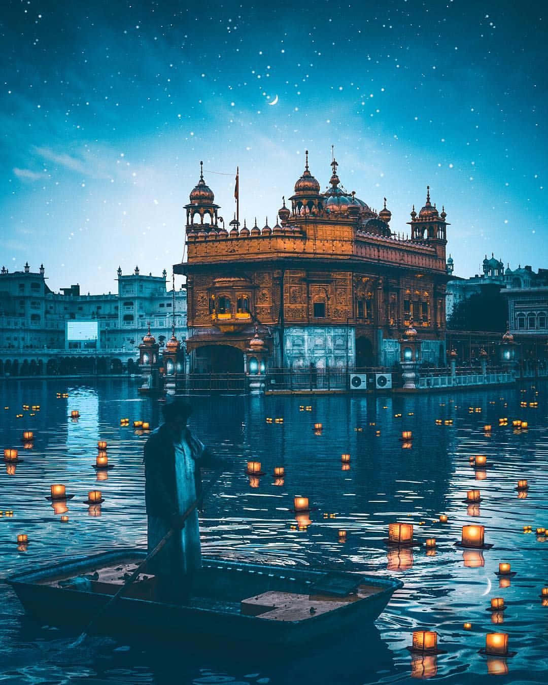 1080x1350 Download Golden Temple With Floating Candles Wallpaper