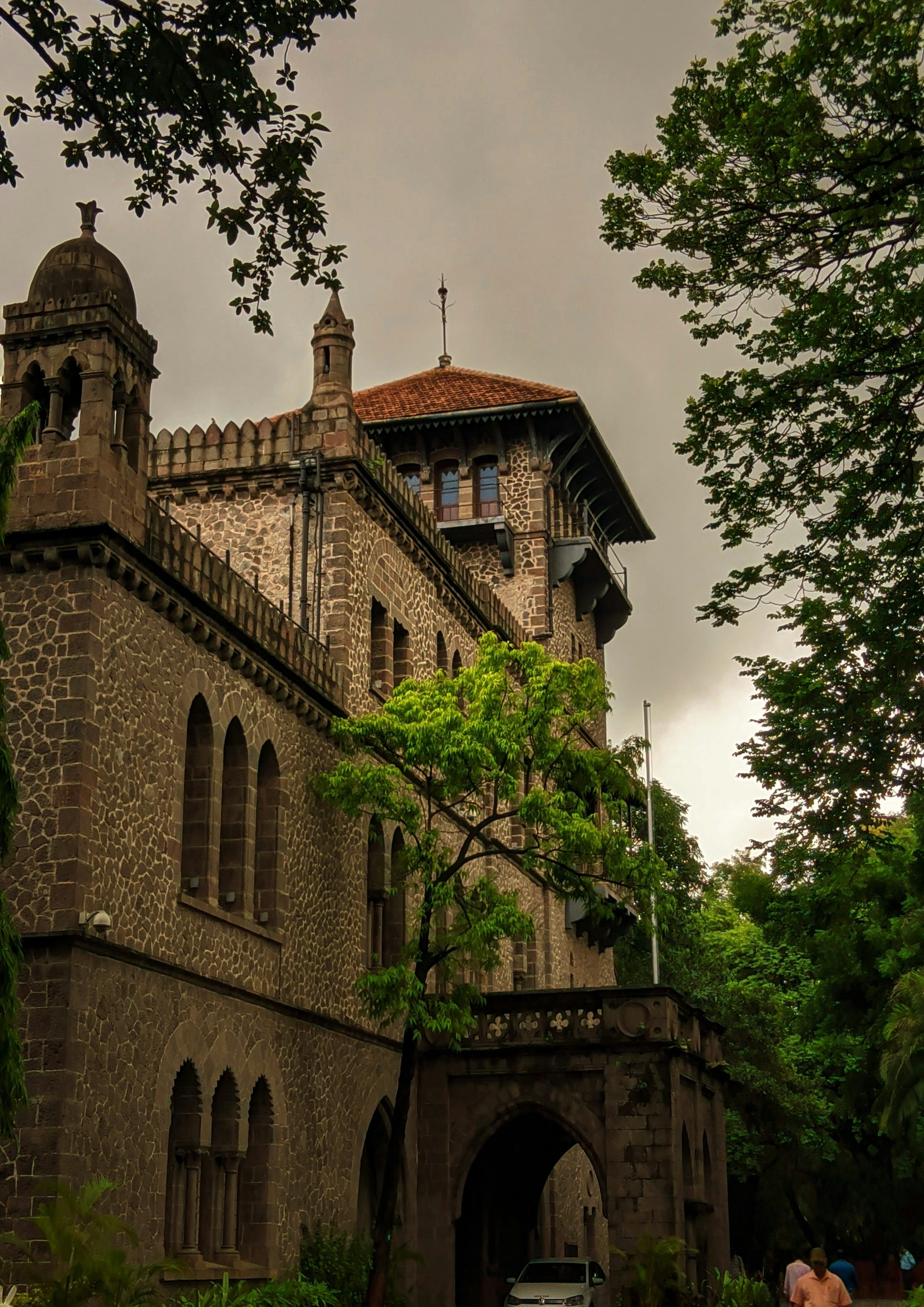 3000x4242 A brick building with a tower
