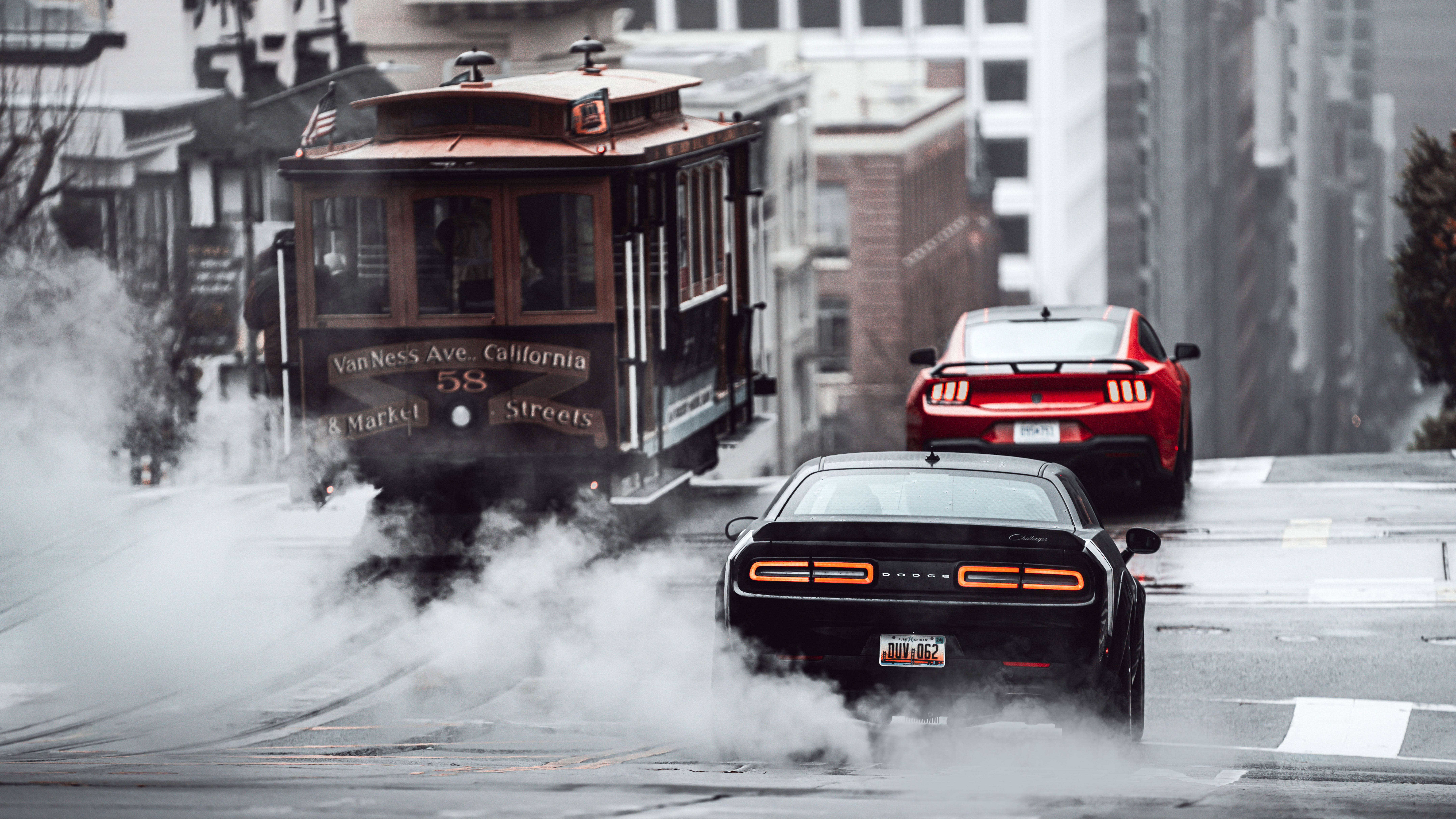 8631x4855 Heavy metal: Dodge Challenger Black Ghost vs Ford Mustang Dark Horse