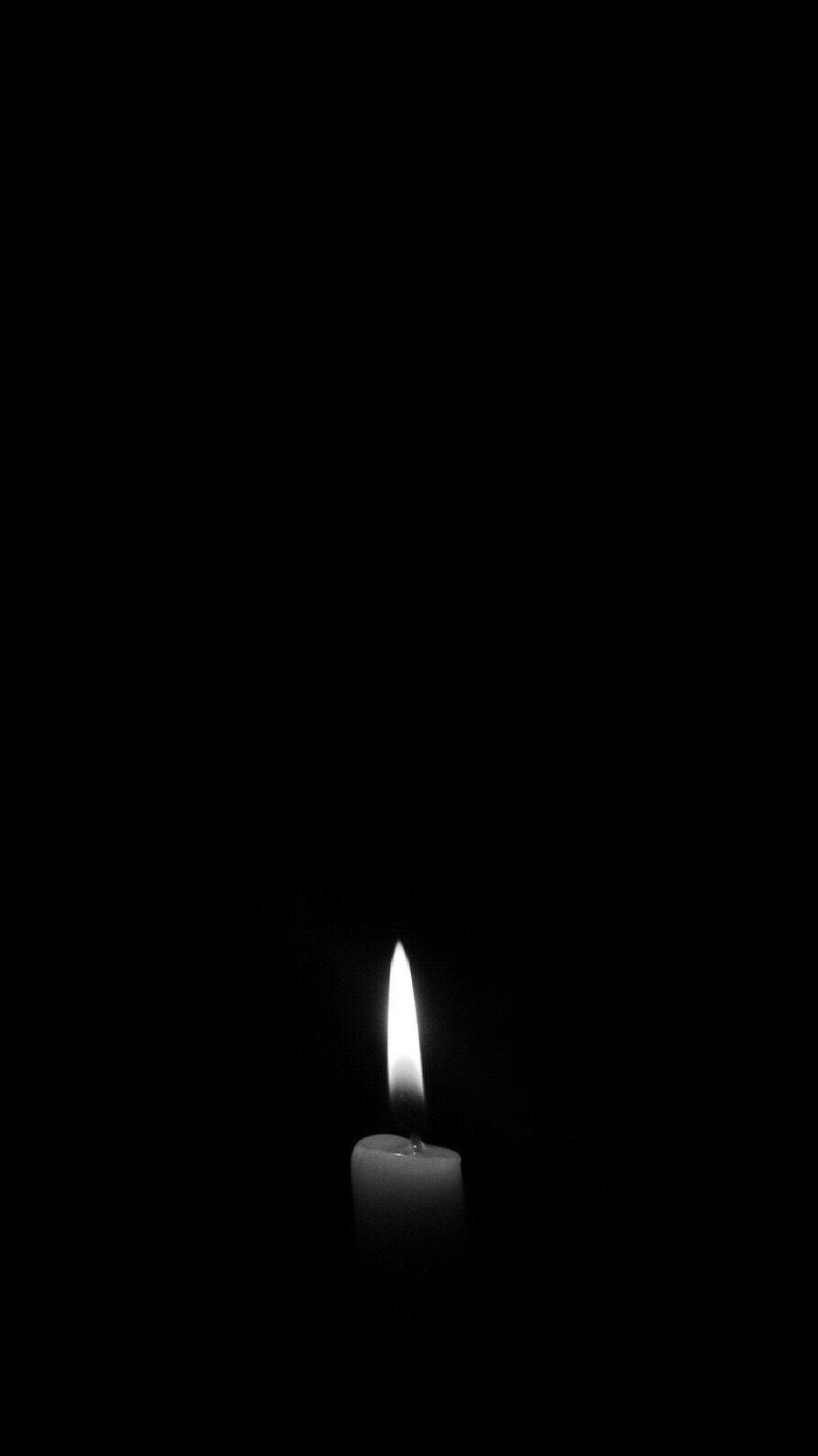 Discover the beauty of Black candle black background for your meditation or relaxation