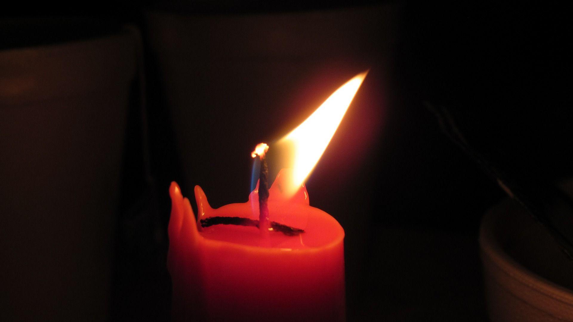1920x1080 Candle Flame Glowing Wallpaper