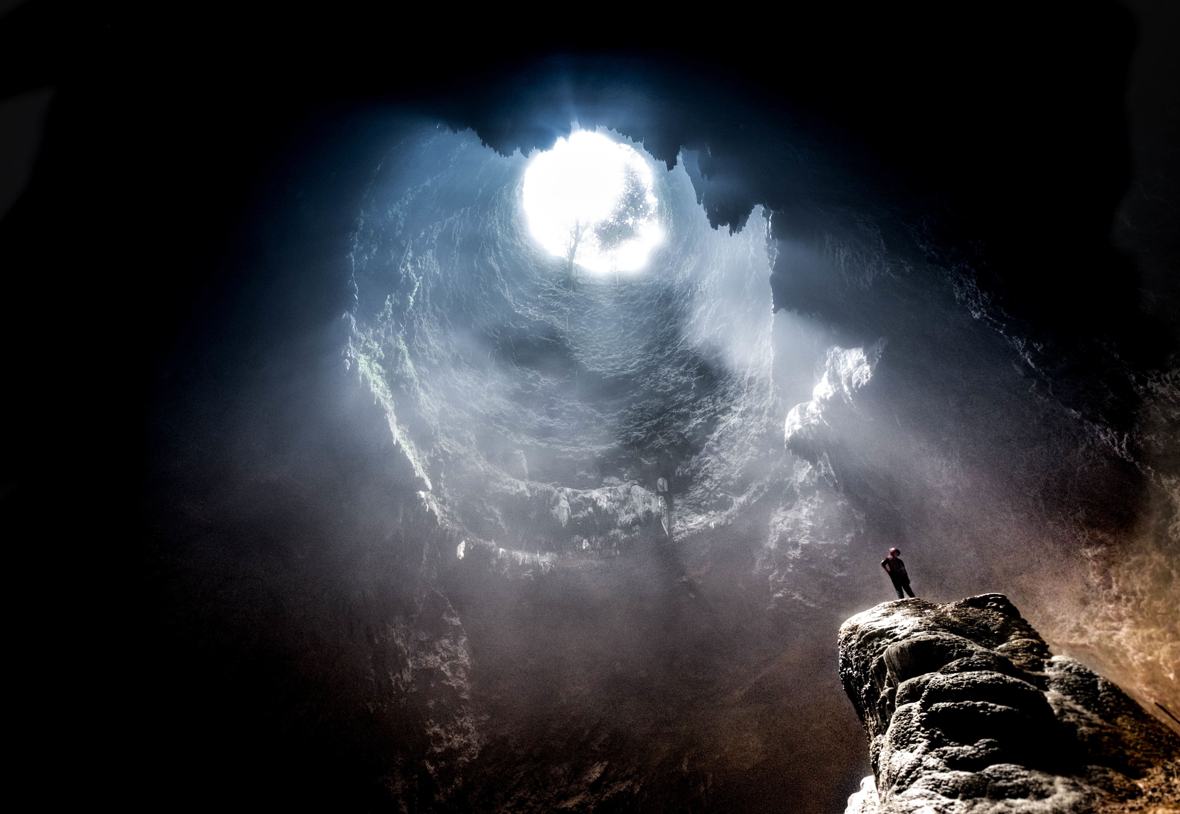 4732x3264 Cave Dark Rocks People Man Alone 5k Wallpaper