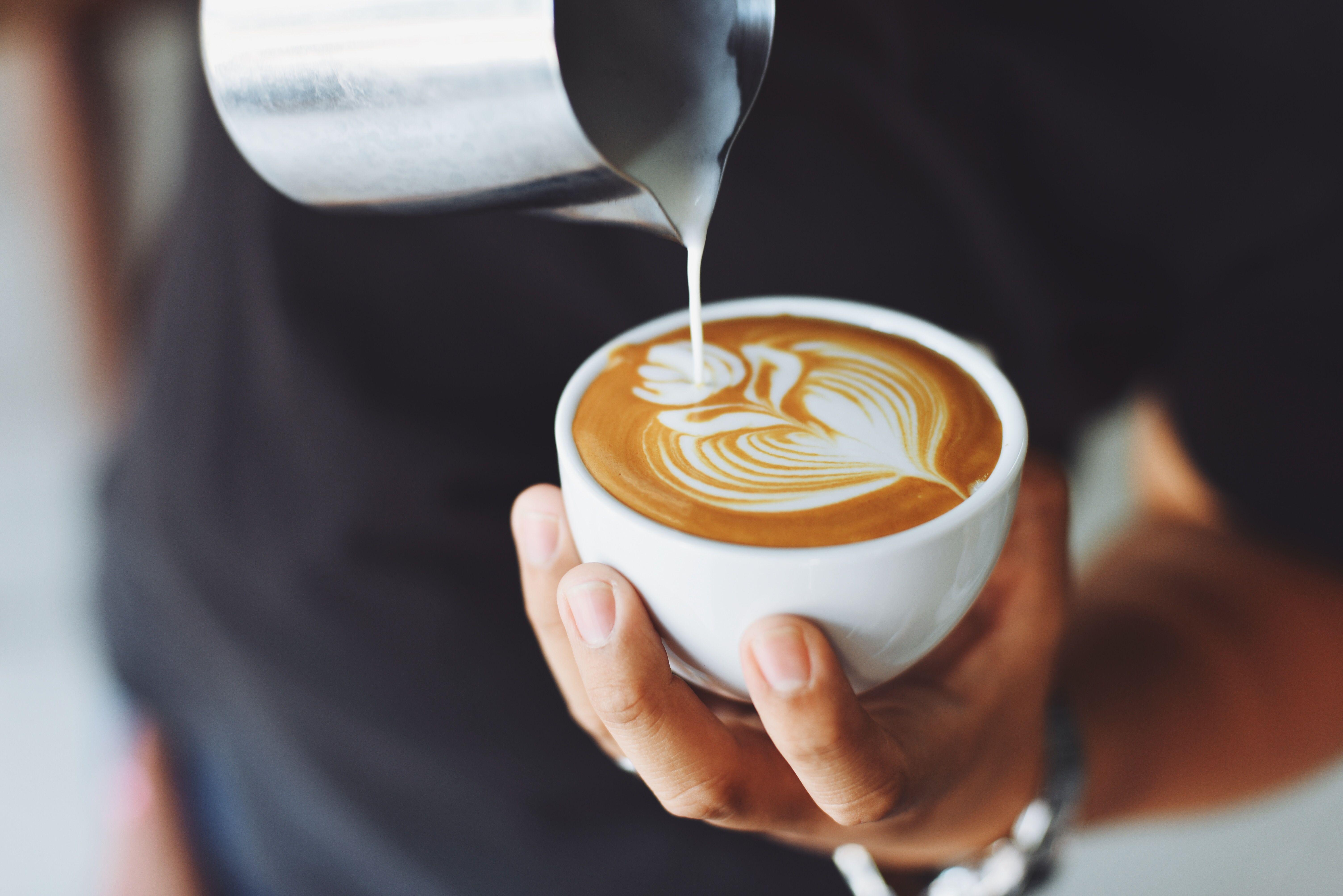 6016x4016 Person Performing Coffee Art · Free