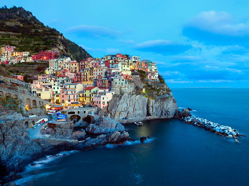 1024x768 A Colorful Cliffside Town in Italy: Our Most Repinned Item of the Week. Condé Nast Traveler