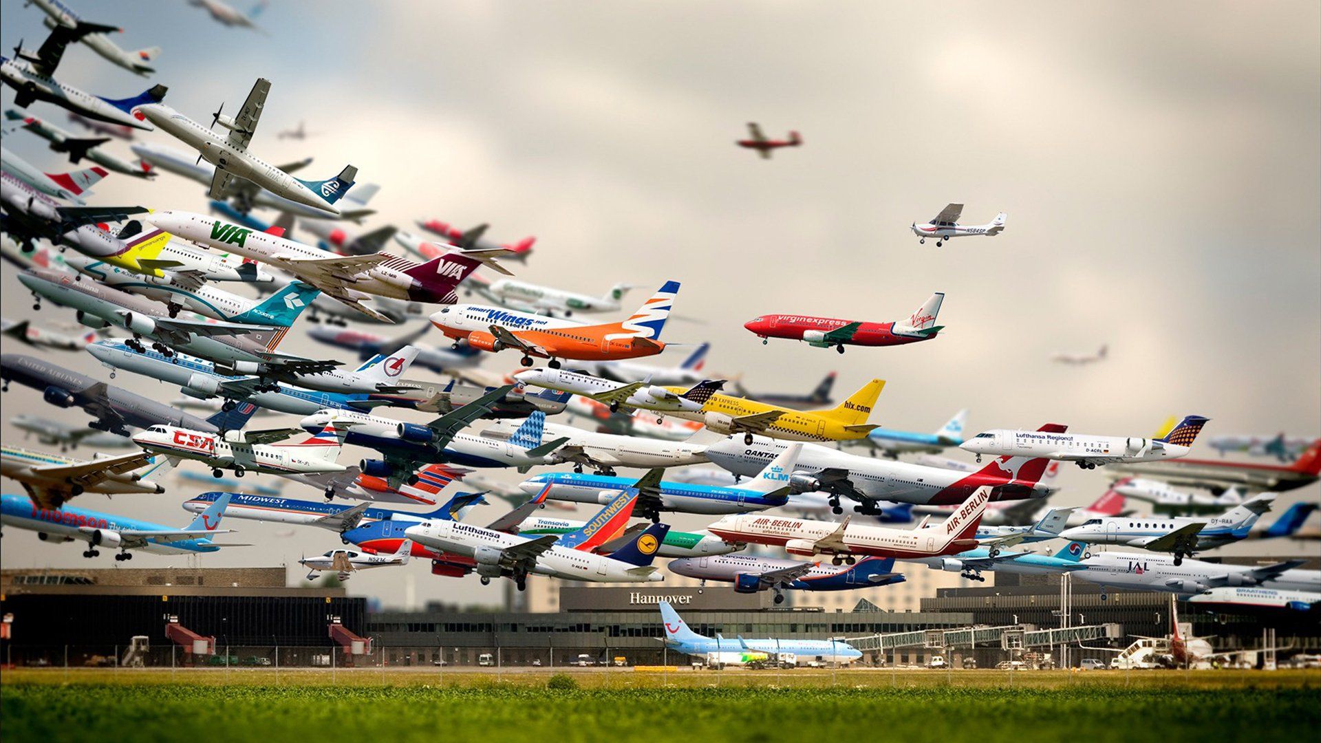 1920x1080 Dynamic Airspace: A Tilt Shift HD Wallpaper Of Aircraft In Motionx1080