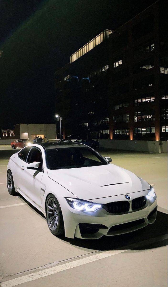 704x1200 White BMW Luxury Car at Night. Black bmw car in nature, White bmw car parked in garage, White bmw car parked outside