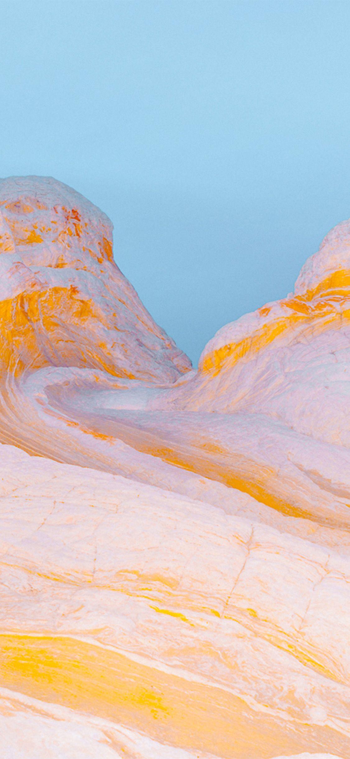 1125x2436 iPhone wallpaper. mountain yellow weird pattern background
