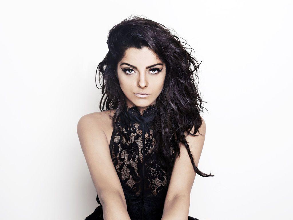 1024x768 Bebe Rexha Wallpaper