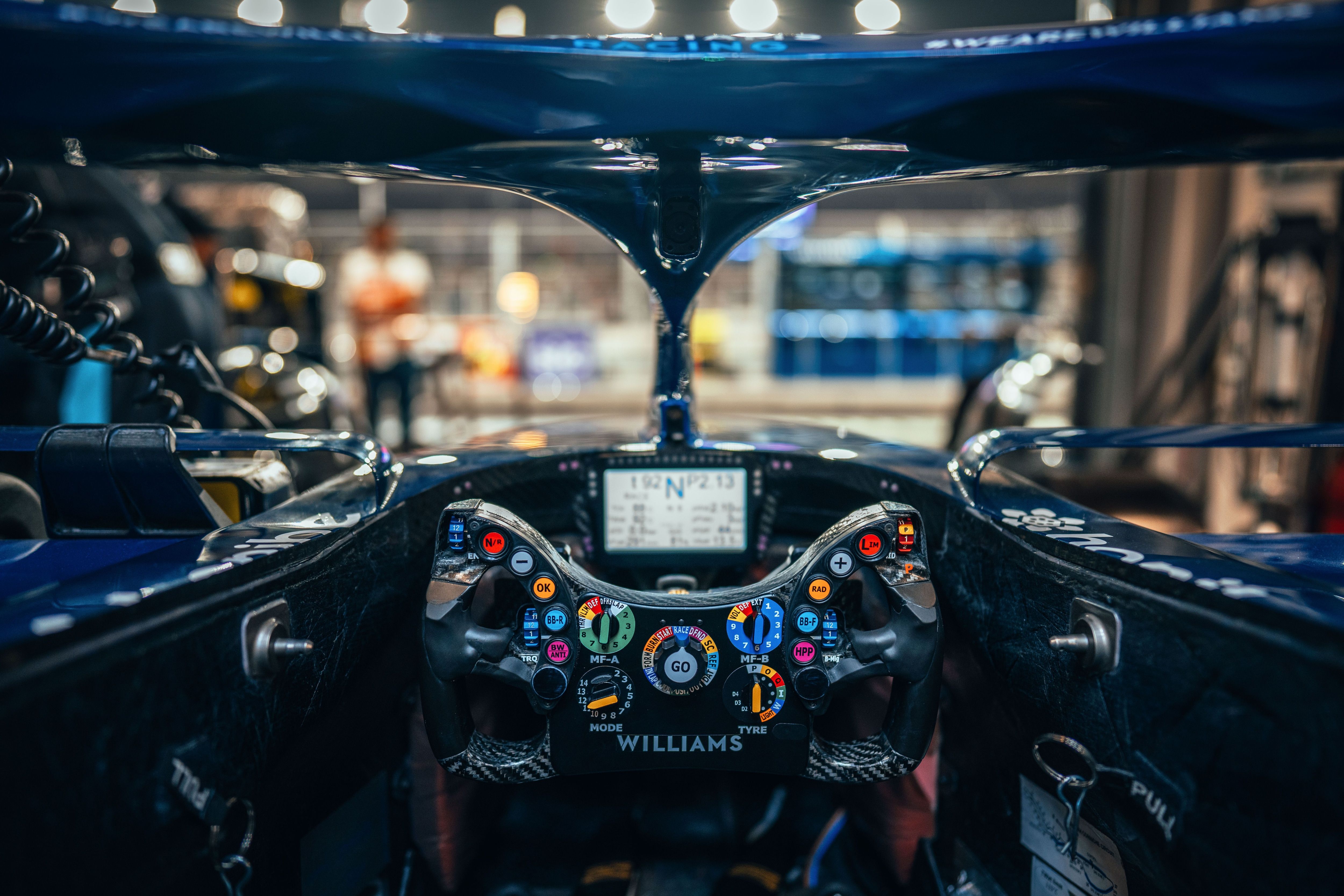 5000x3333 F1 racecar steering wheel buttons, explained