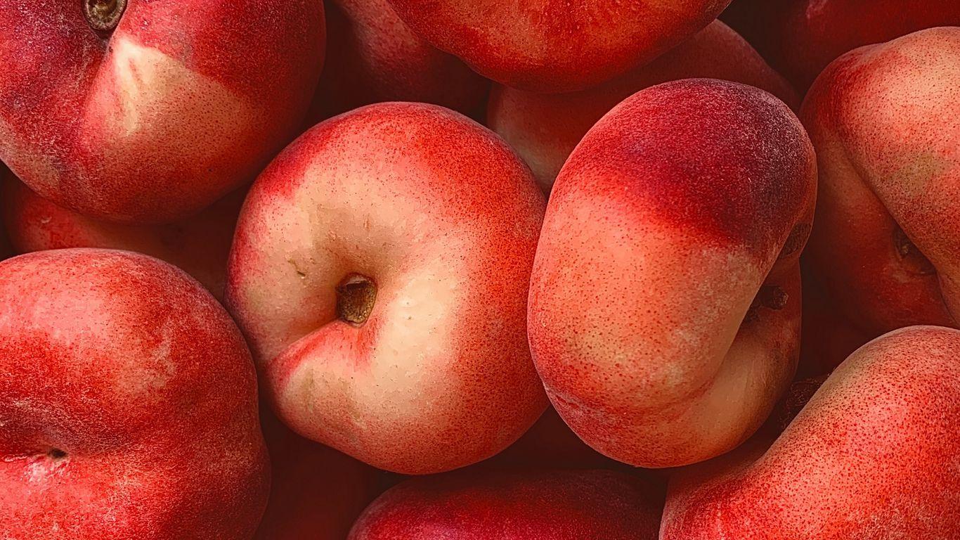 1366x768 Download wallpaper 1366x768 peach, tropical, fruit, macro tablet, laptop HD background