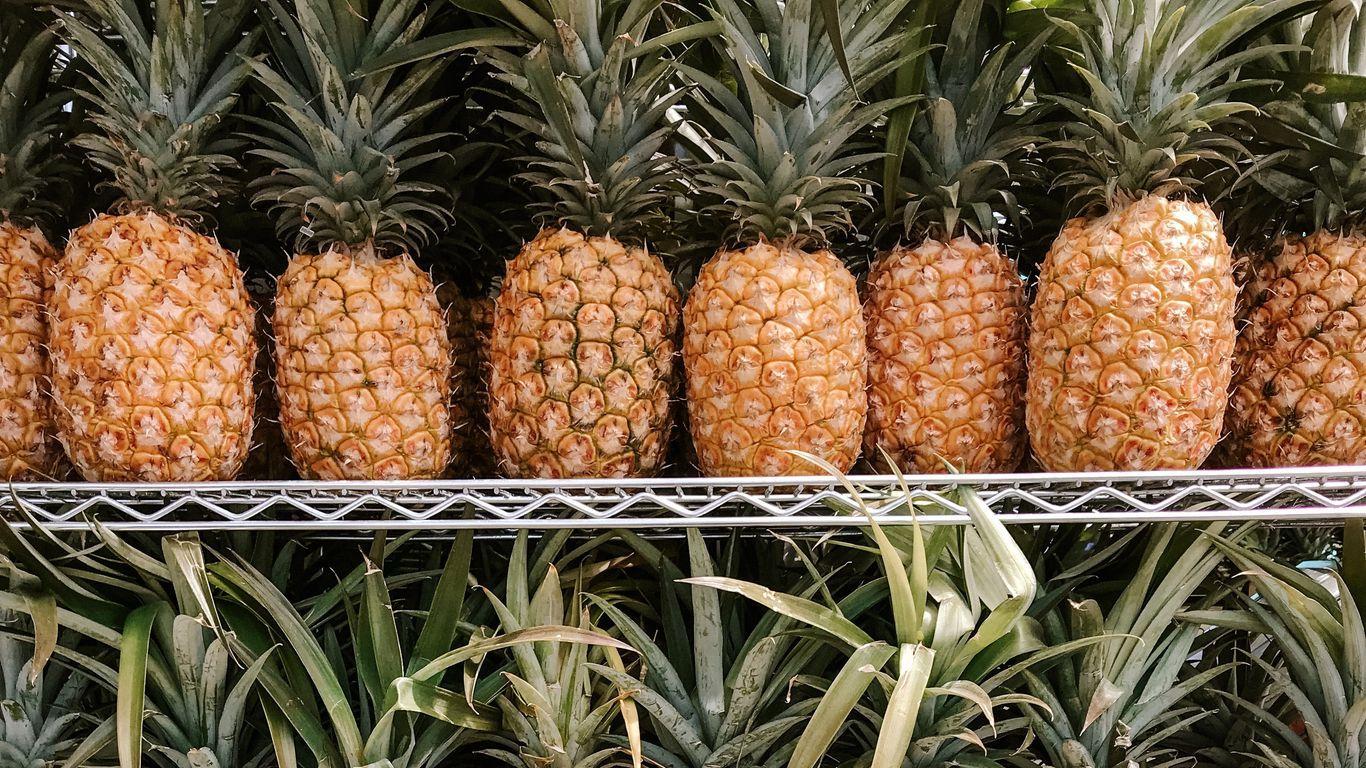1366x768 Download wallpaper 1366x768 pineapples, fruit, tropical, shelf tablet, laptop HD background