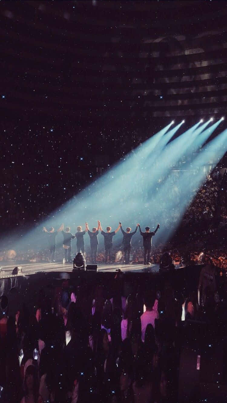 750x1334 Download K Pop Group BTS Concert Stage Background