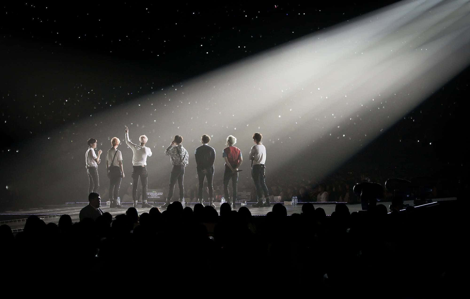 2000x1273 Download Korean Idols BTS On Concert Stage Wallpaper