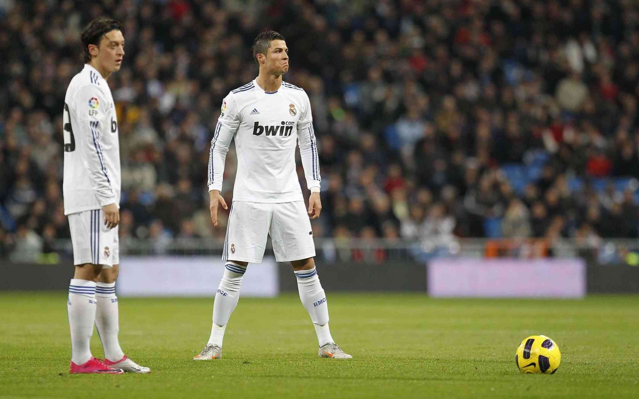 2560x1600 Ozil And Ronaldo Wallpaper