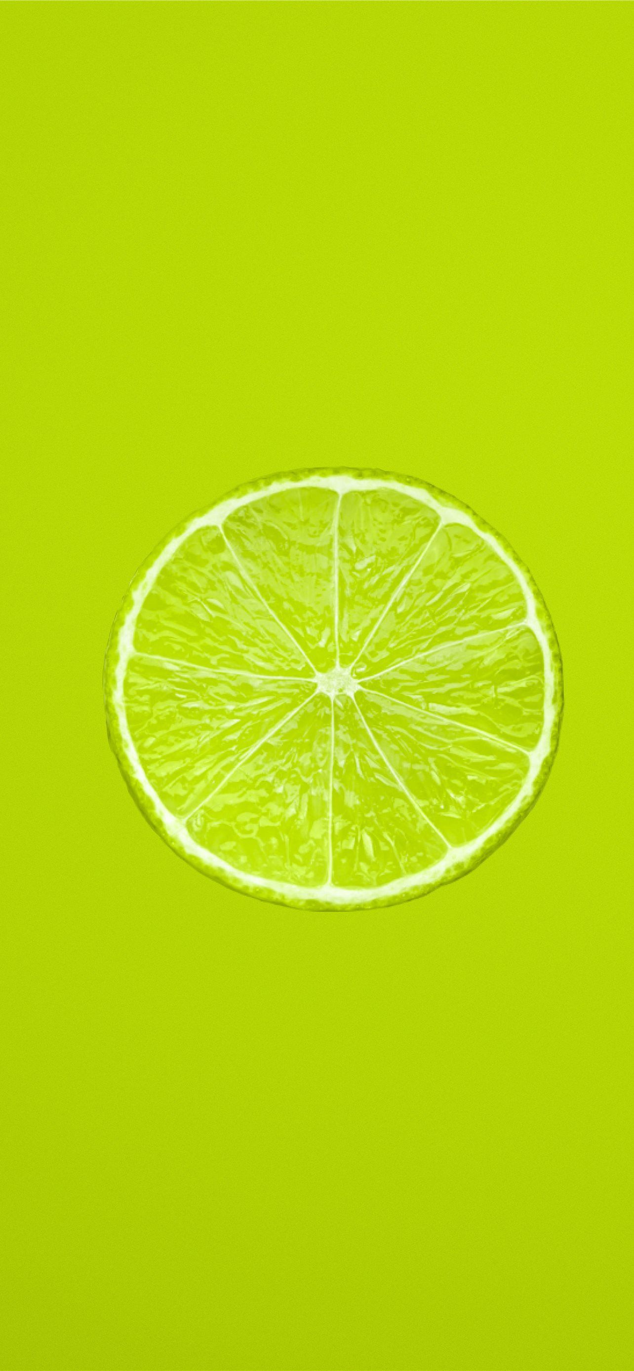 1284x2778 yellow lemon fruit on green background iPhone Wallpaper Free Download