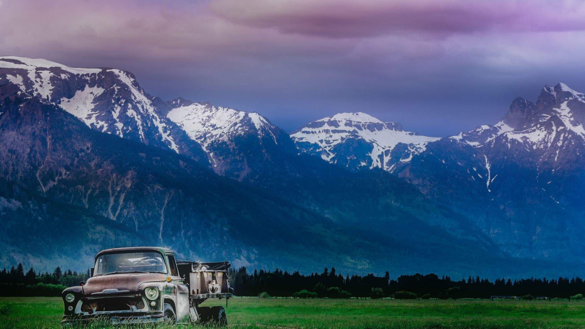 1920x1080 Old Dump Truck In Meadow Under Mountain
