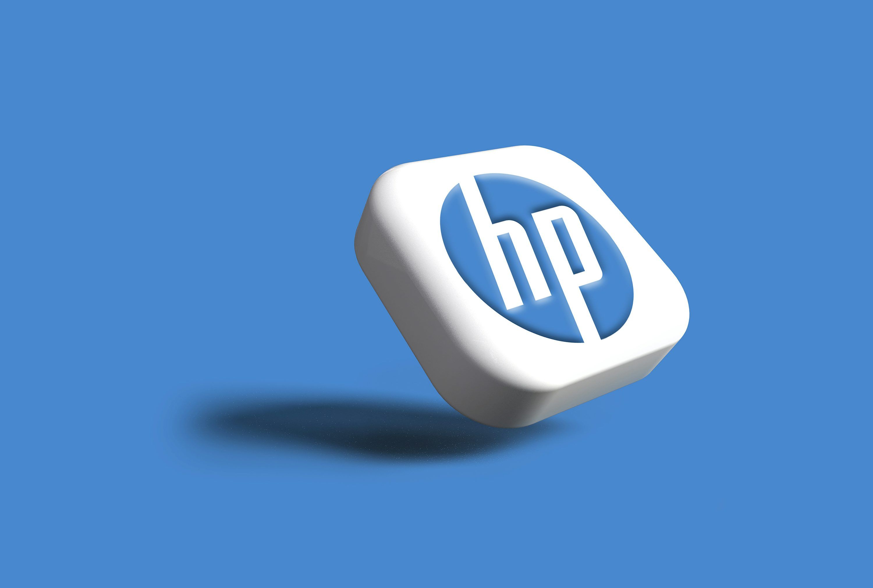 3000x2021 A white hp logo on a blue background