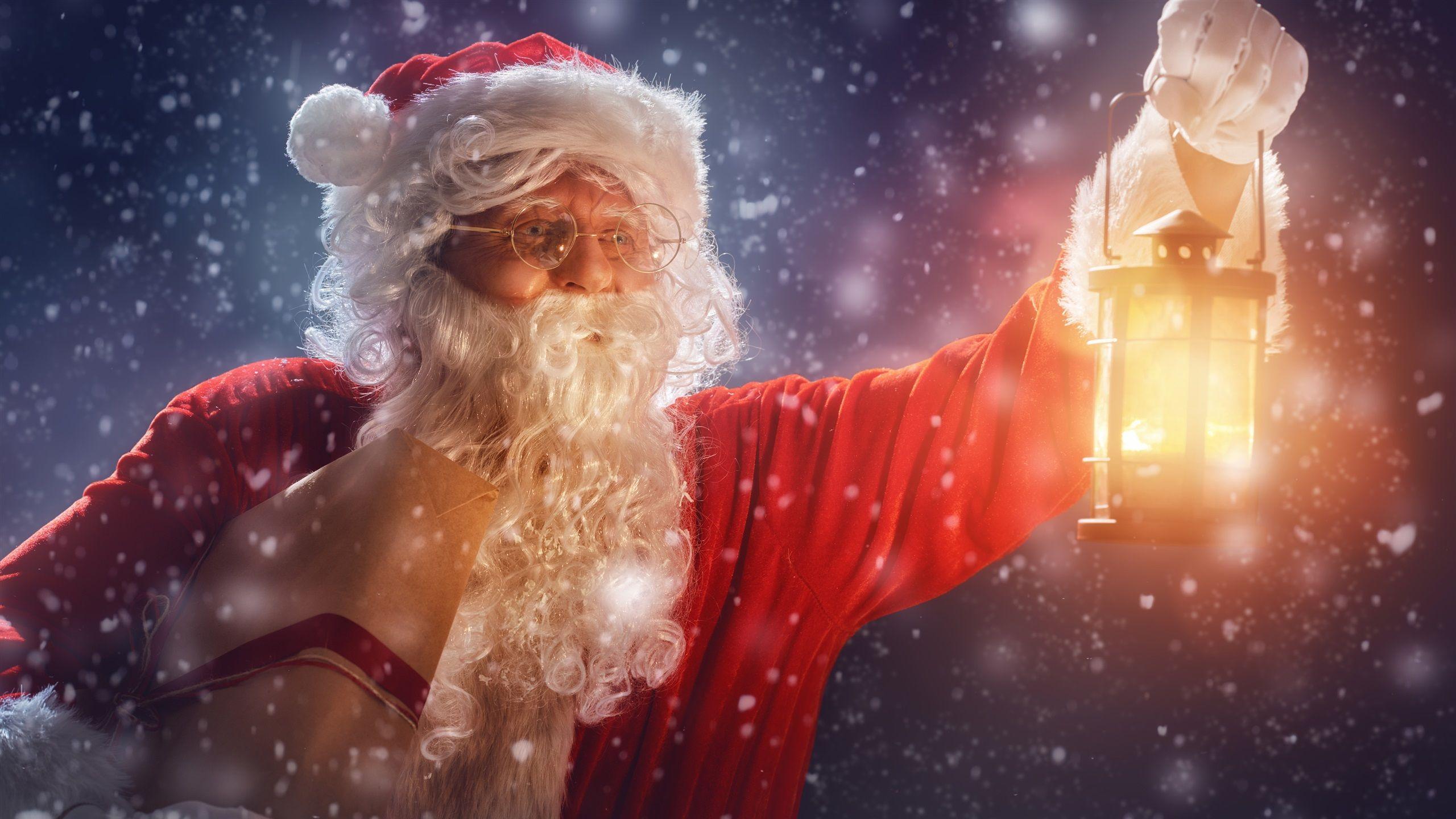 2560x1440 Wallpaper Christmas, Santa Claus, gifts, snow, lantern 3840x2160 UHD 4K Picture, Image