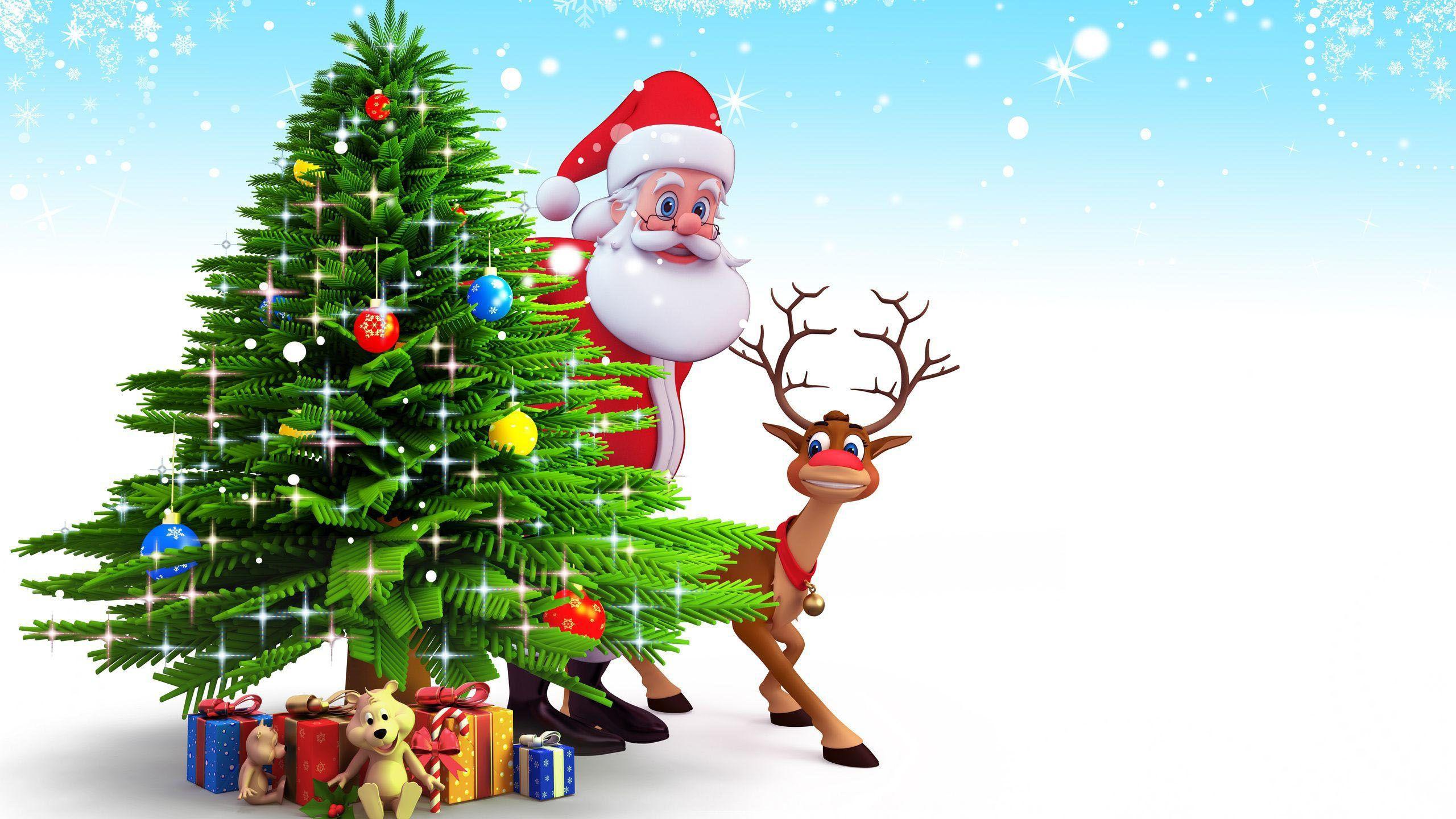 2560x1440 Santa Claus Is Standing Near Christmas Tree With Deer HD Santa Claus Wallpaper