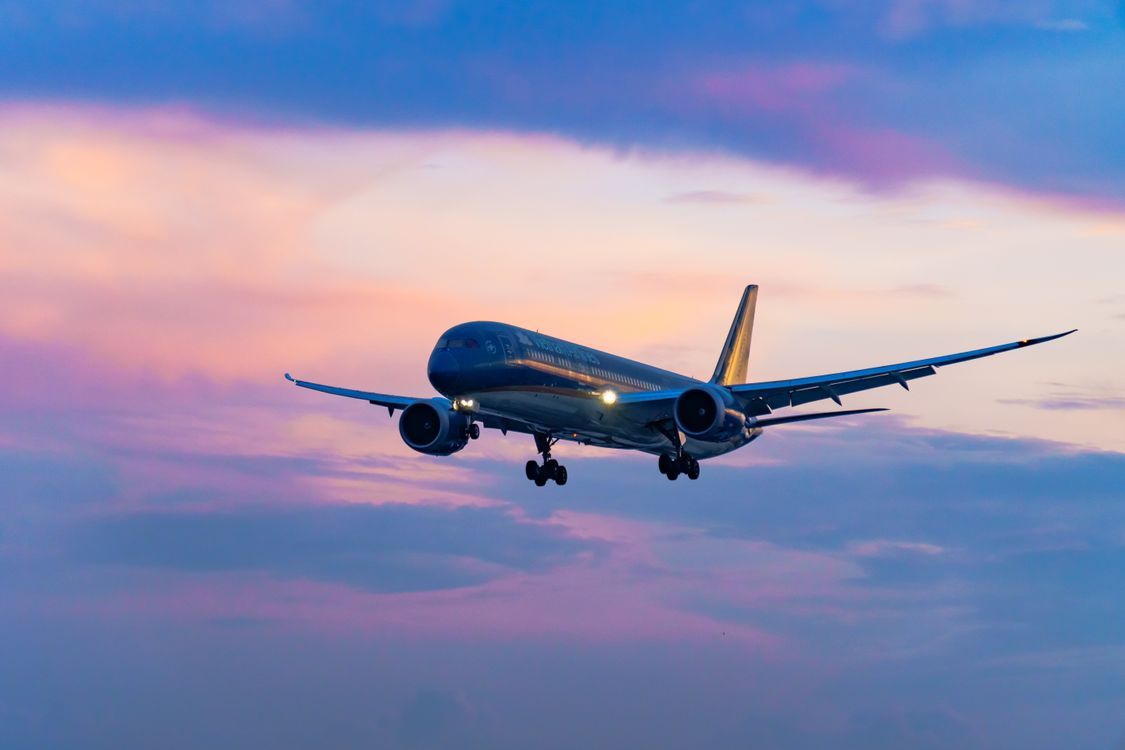 1125x750 Airplane in Pink Sunset Sky · Free