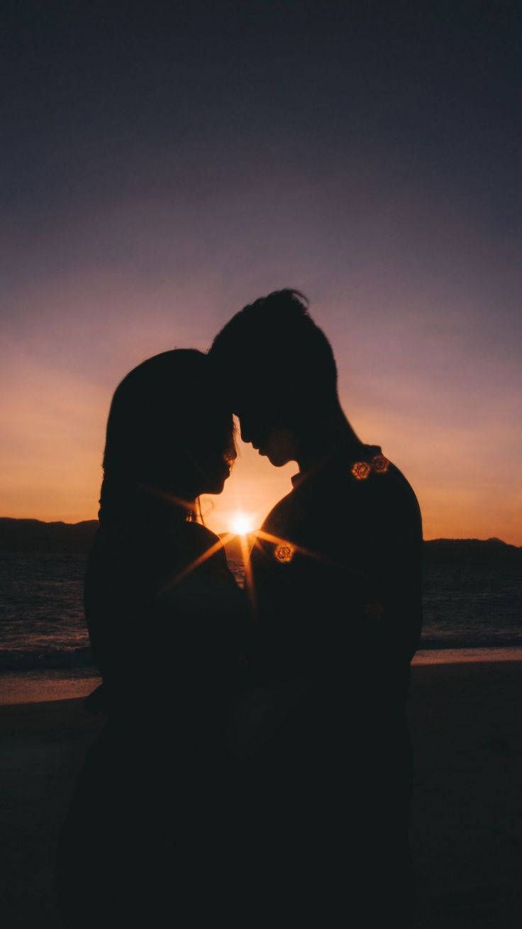 736x1308 Download Silhouette Of Love Cute Couple Wallpaper