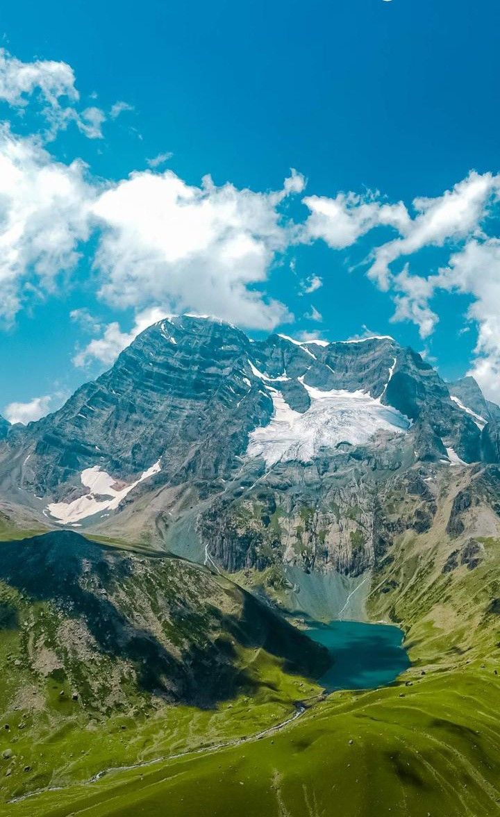 720x1176 Snow Covered Mountains And Green Grass. Switzerland Alps Iphone Wallpaper, Pakistan Mountain Wallpaper, Mountain View Wallpaper For Mobile