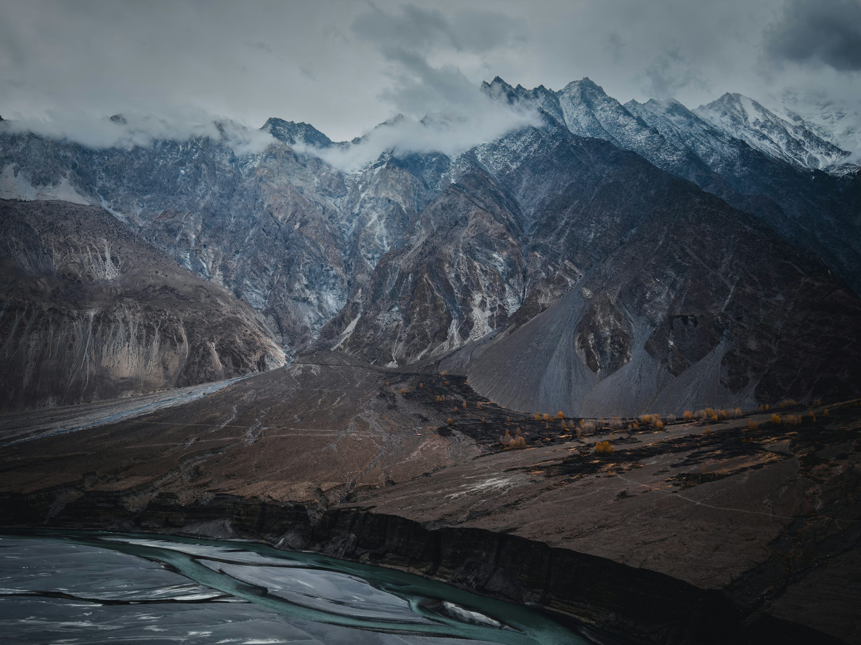 3000x2250 Snow Capped Mountains And A Winding River Under Cloudy Skies