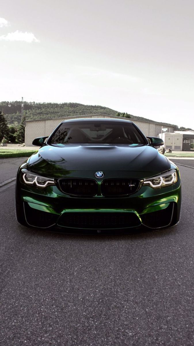 674x1200 Green BMW Car Parked on the Street. Bmw front view, Dream car inspiration, Green bmw sports car