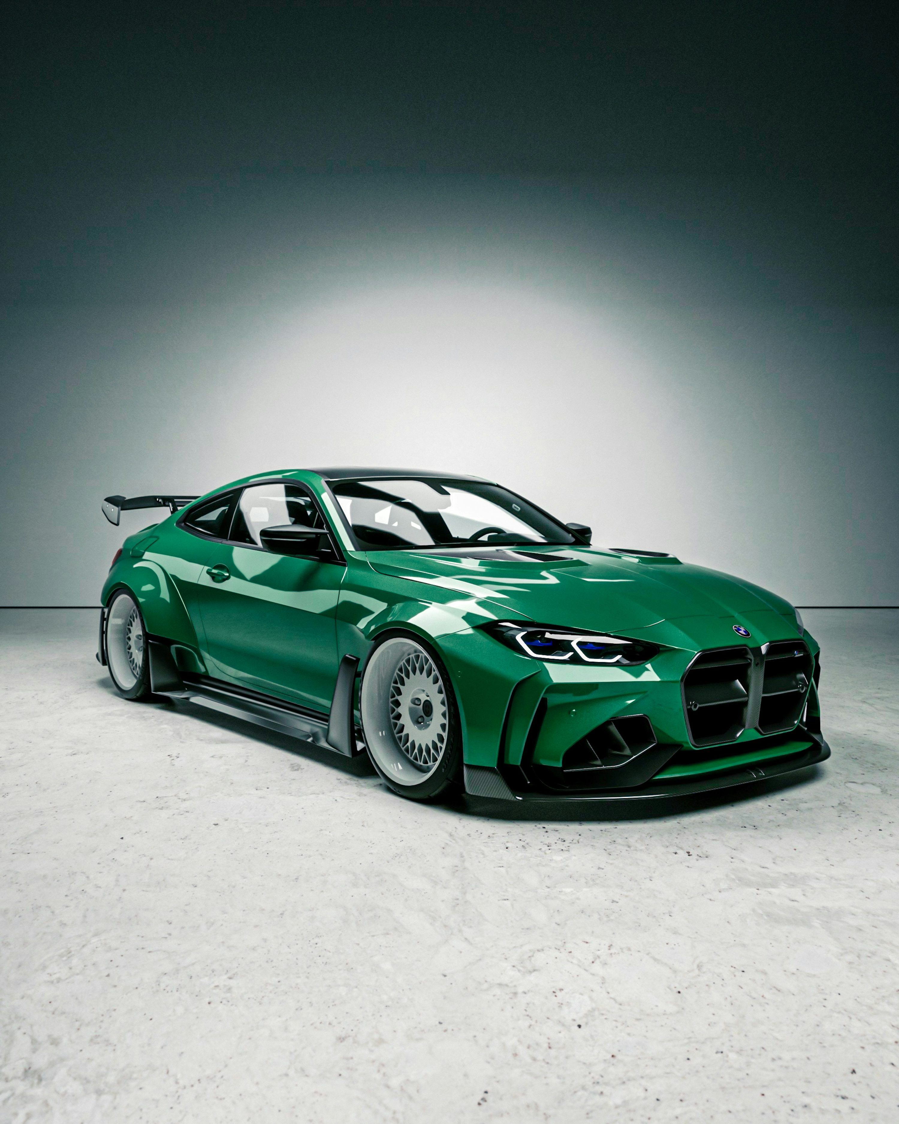 3000x3750 A green BMW sports car is shown