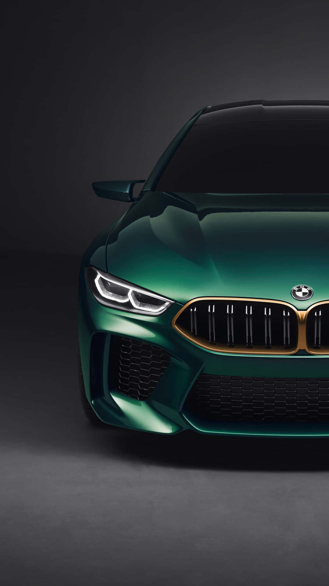 1080x1920 Download Dark Green Bmw M8 Half View 4K Mobile Wallpaper