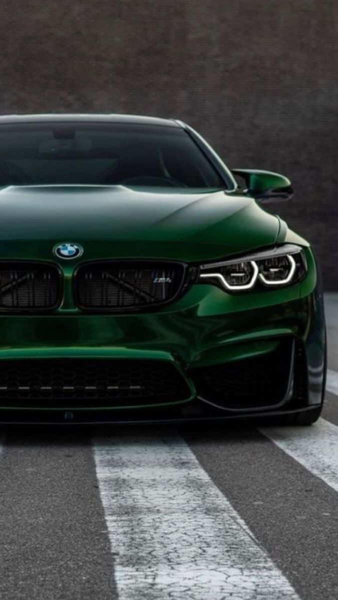 675x1200 Green BMW M4 Driving on the Road. Bmw sleek design, Dream car inspiration, Green bmw sports car