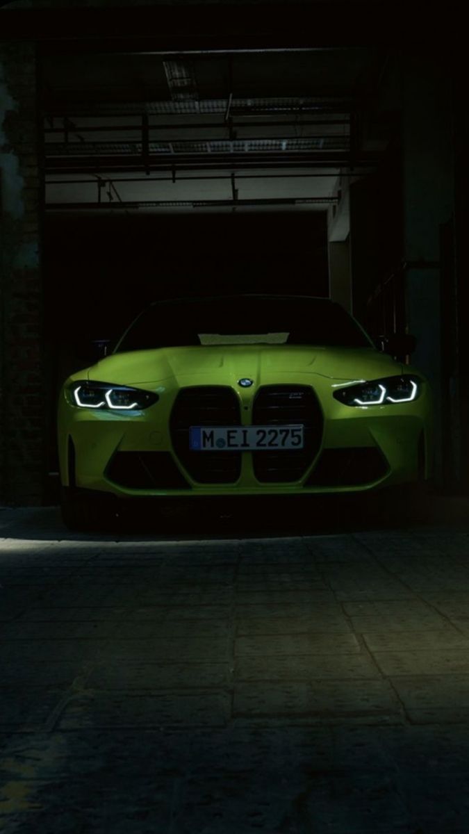 675x1200 Green BMW M4 in a Dark Parking Garage. Bmw car night lighting, Dream car inspiration, Green bmw car in garage
