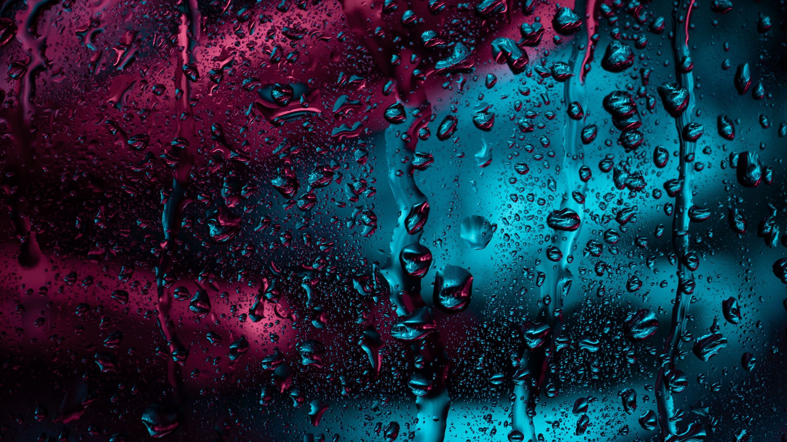 2560x1440 Download wallpaper 2560x1440 drops, glass, rain, moisture, window, surface, dark widescreen 16:9 HD background