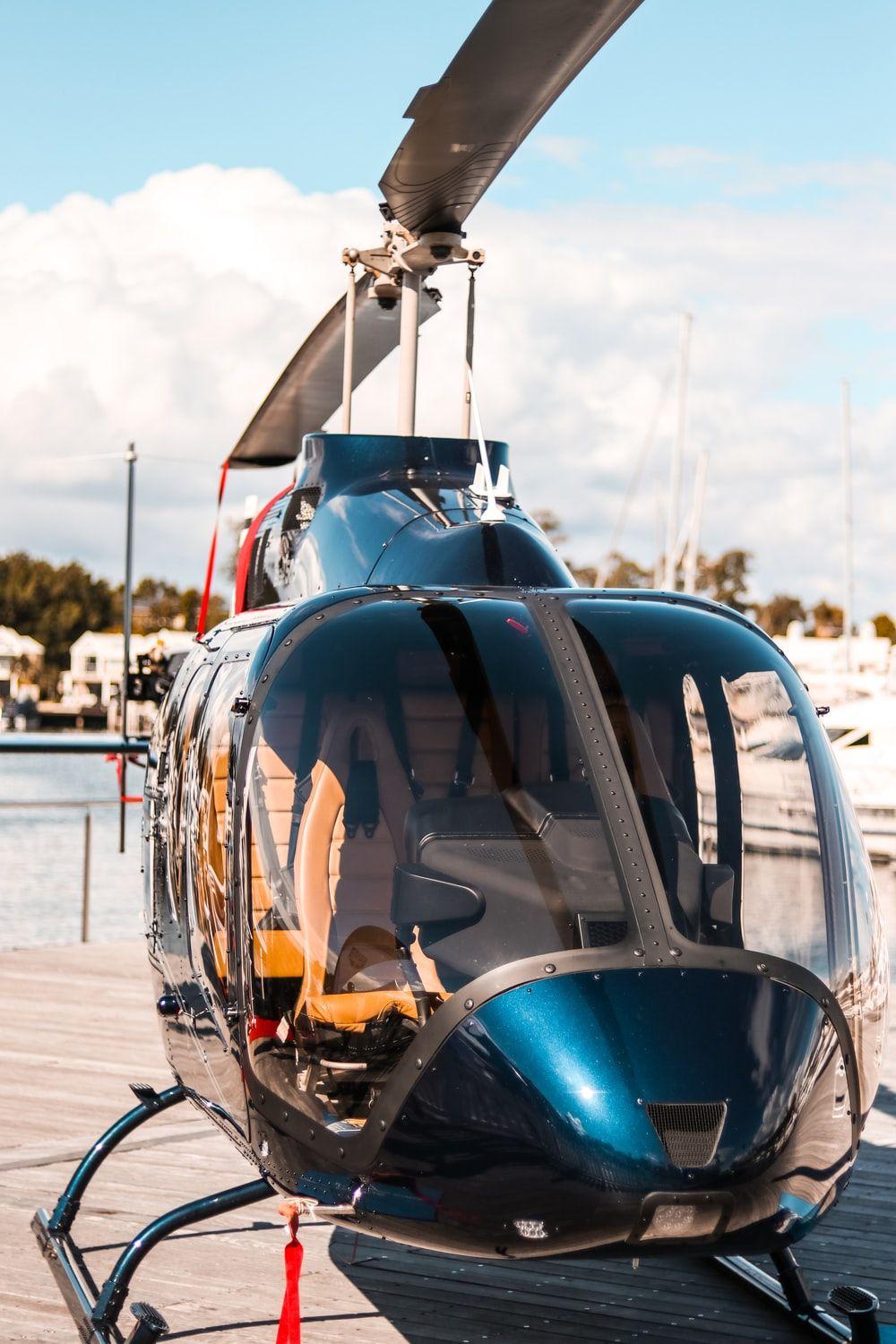 1000x1500 empty black helicopter photo