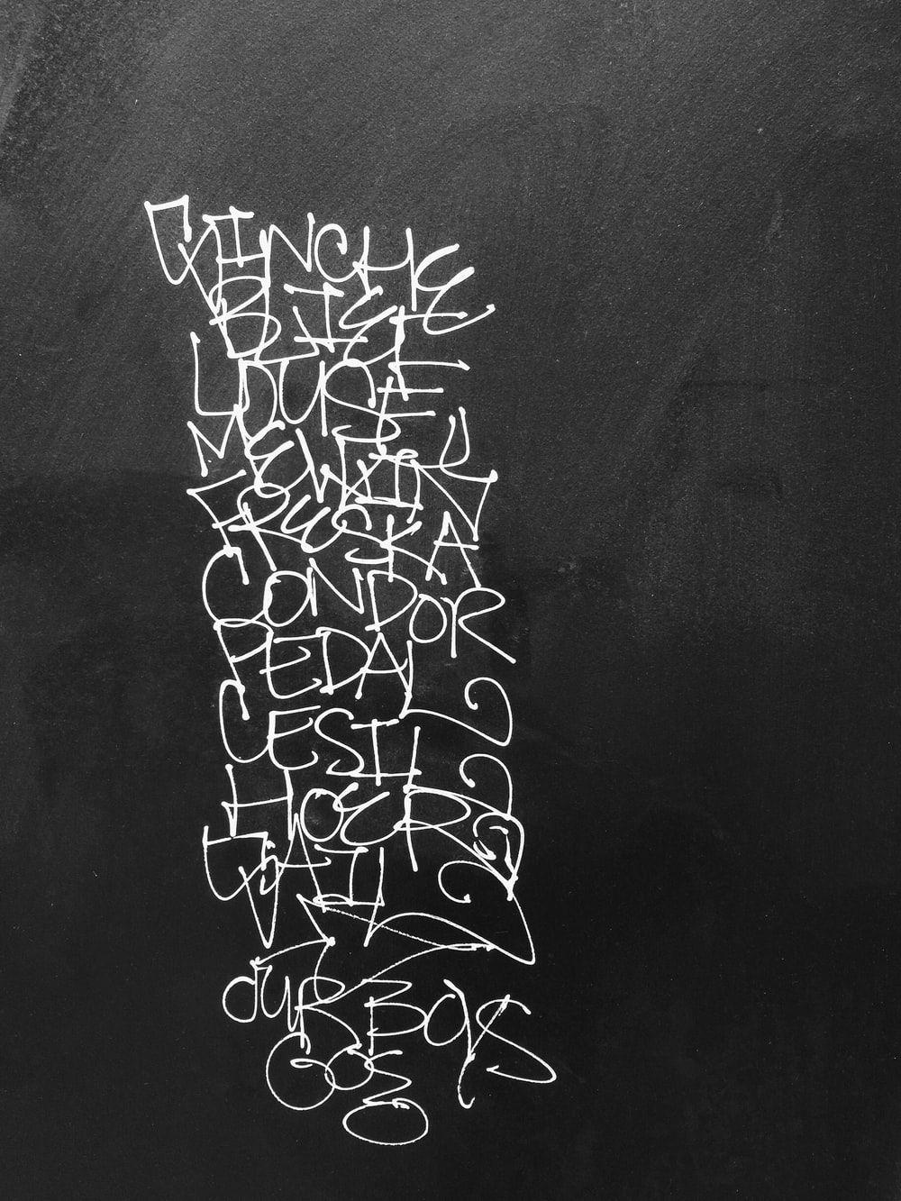 1000x1333 white graffiti on chalkboard photo