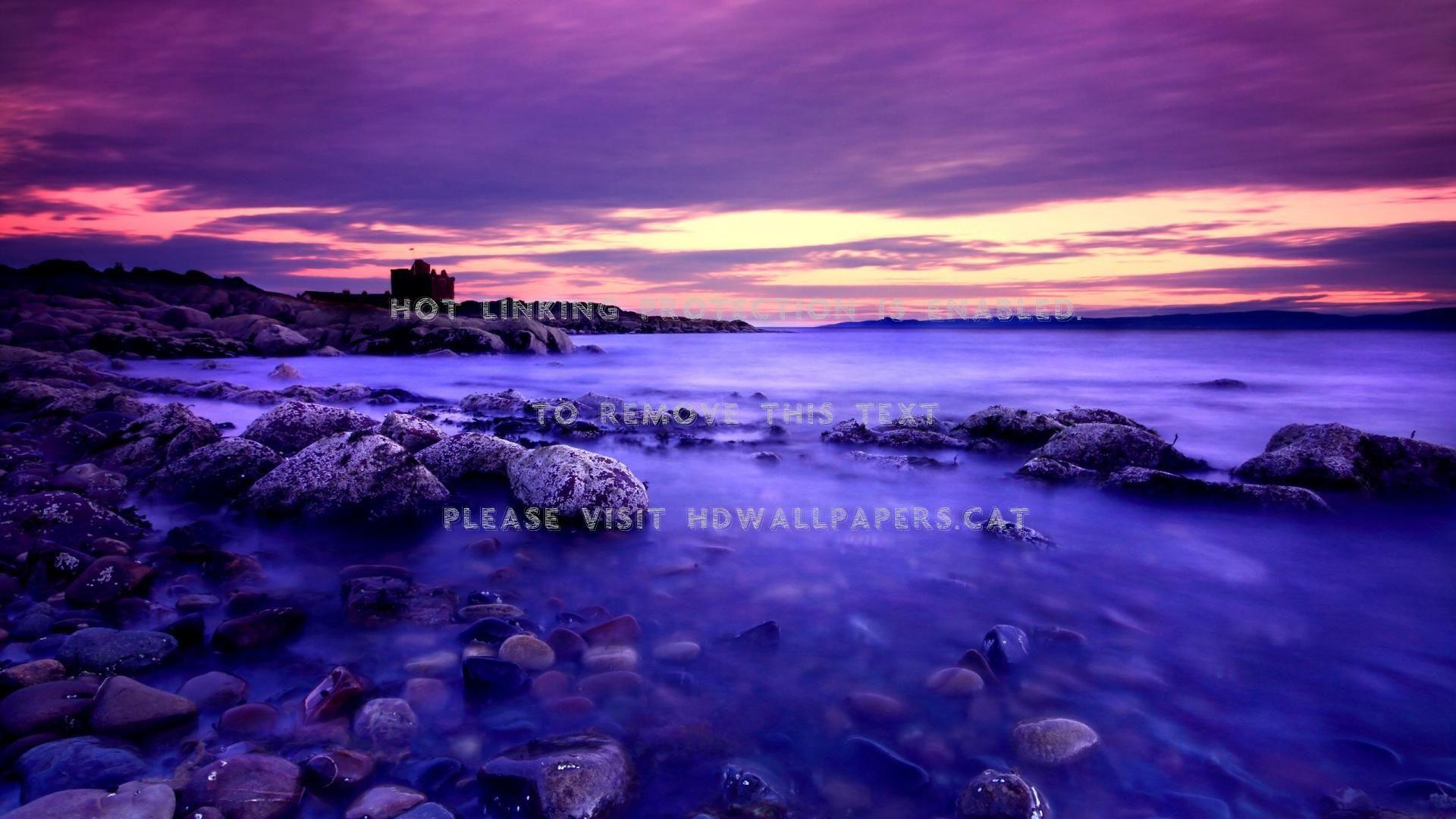 1920x1080 purple beach sunset stones sea cloudshdwallpaper.cat