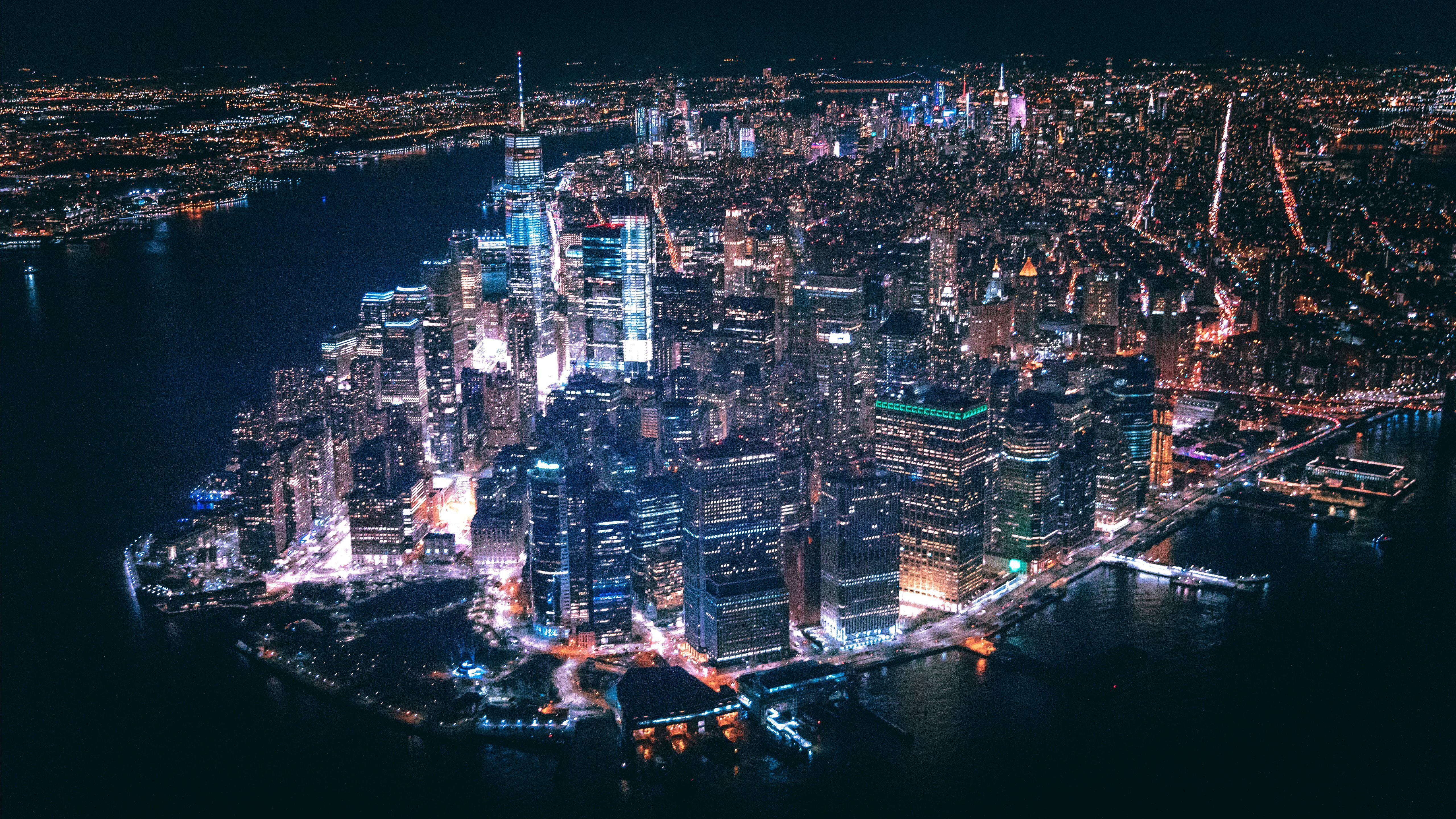 5120x2880 aerial view of city buildings during nighttime iMac Wallpaper Download