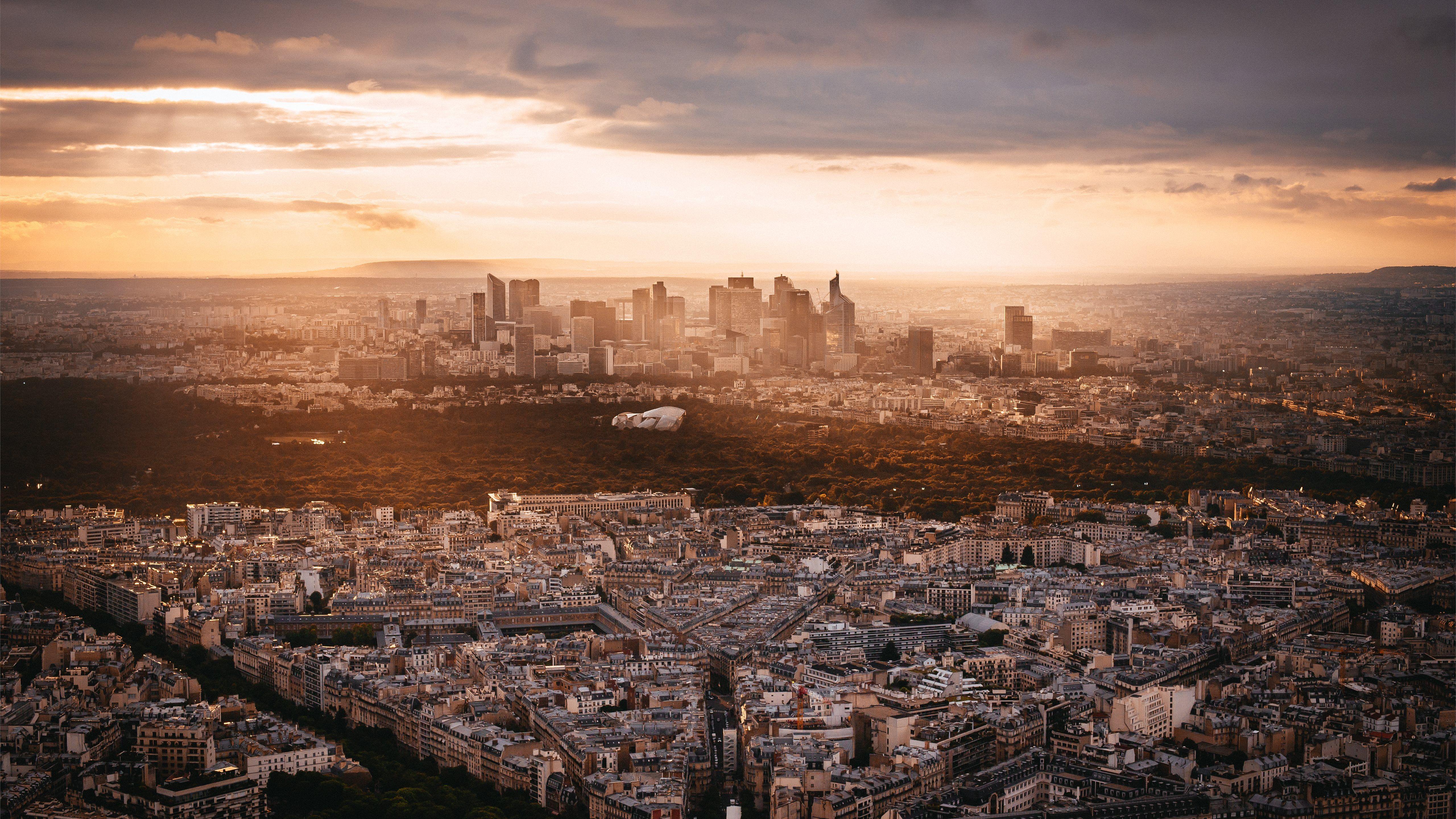 5120x2880 aerial view of city during golden hour .