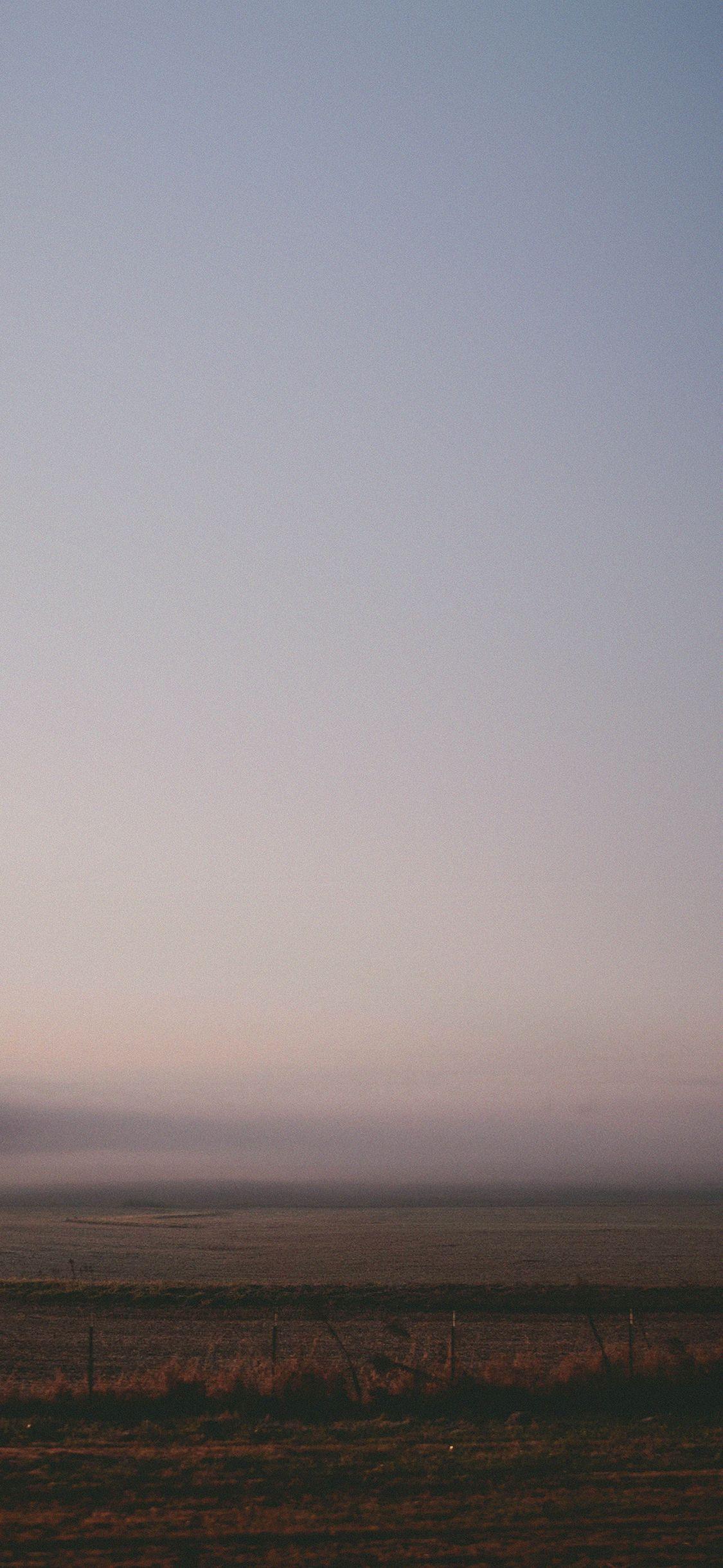 1125x2436 Foggy Land Wide Nature Sonja .