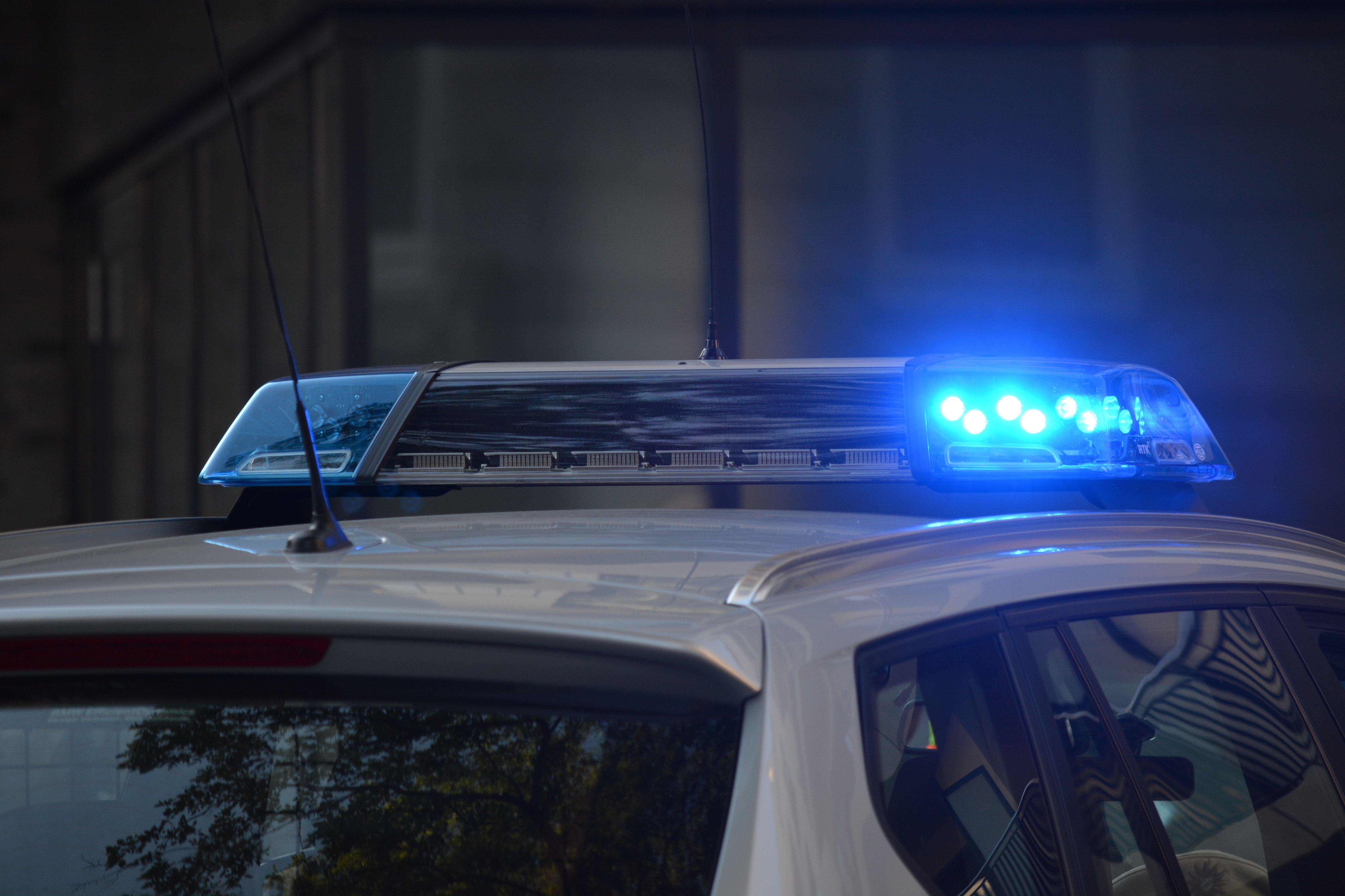 6000x4000 Vehicle Blue Emergency Light Turned on .
