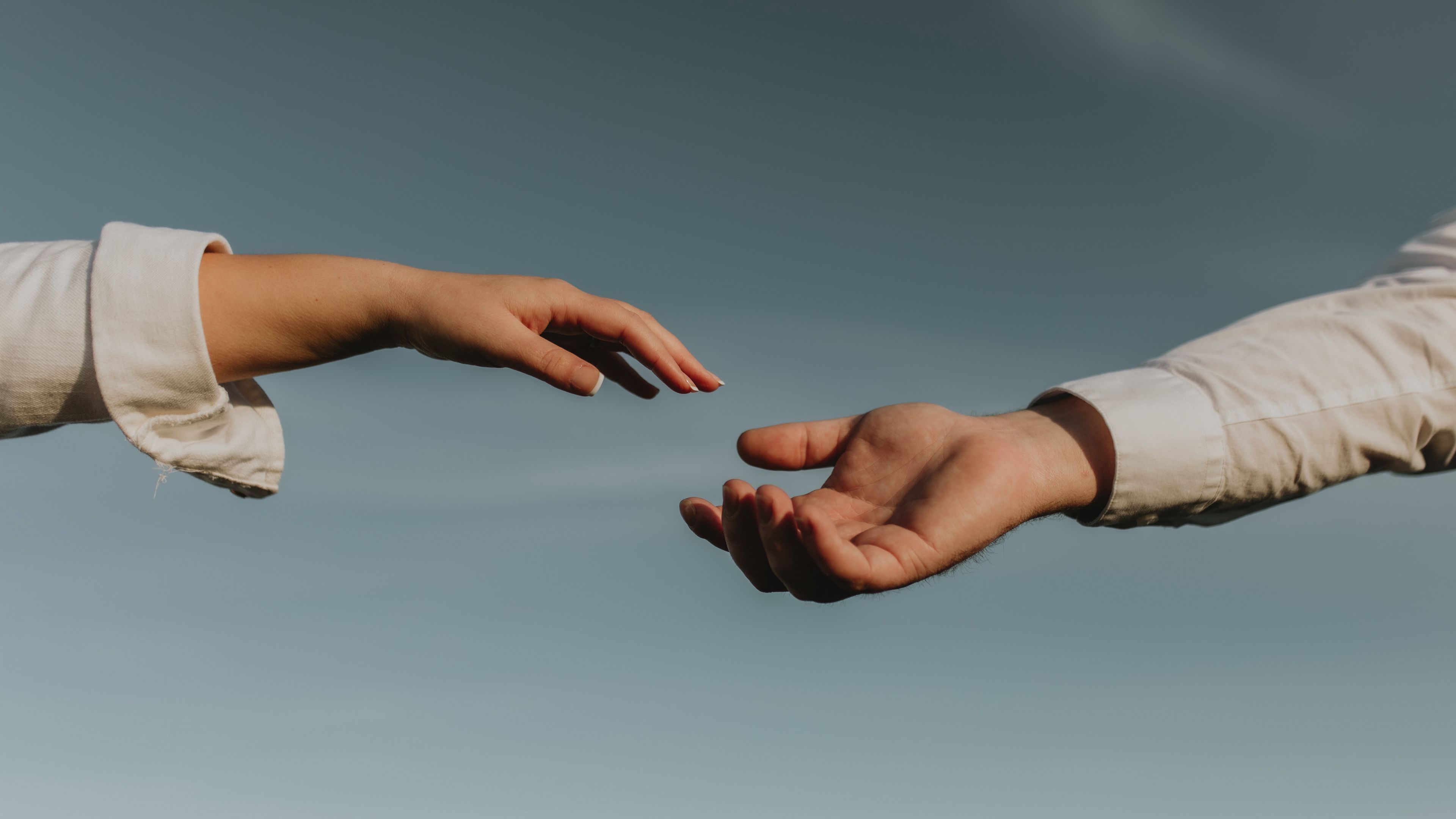 3840x2160 Download wallpaper 3840x2160 hands, touch, couple 4k uhd 16:9 HD background