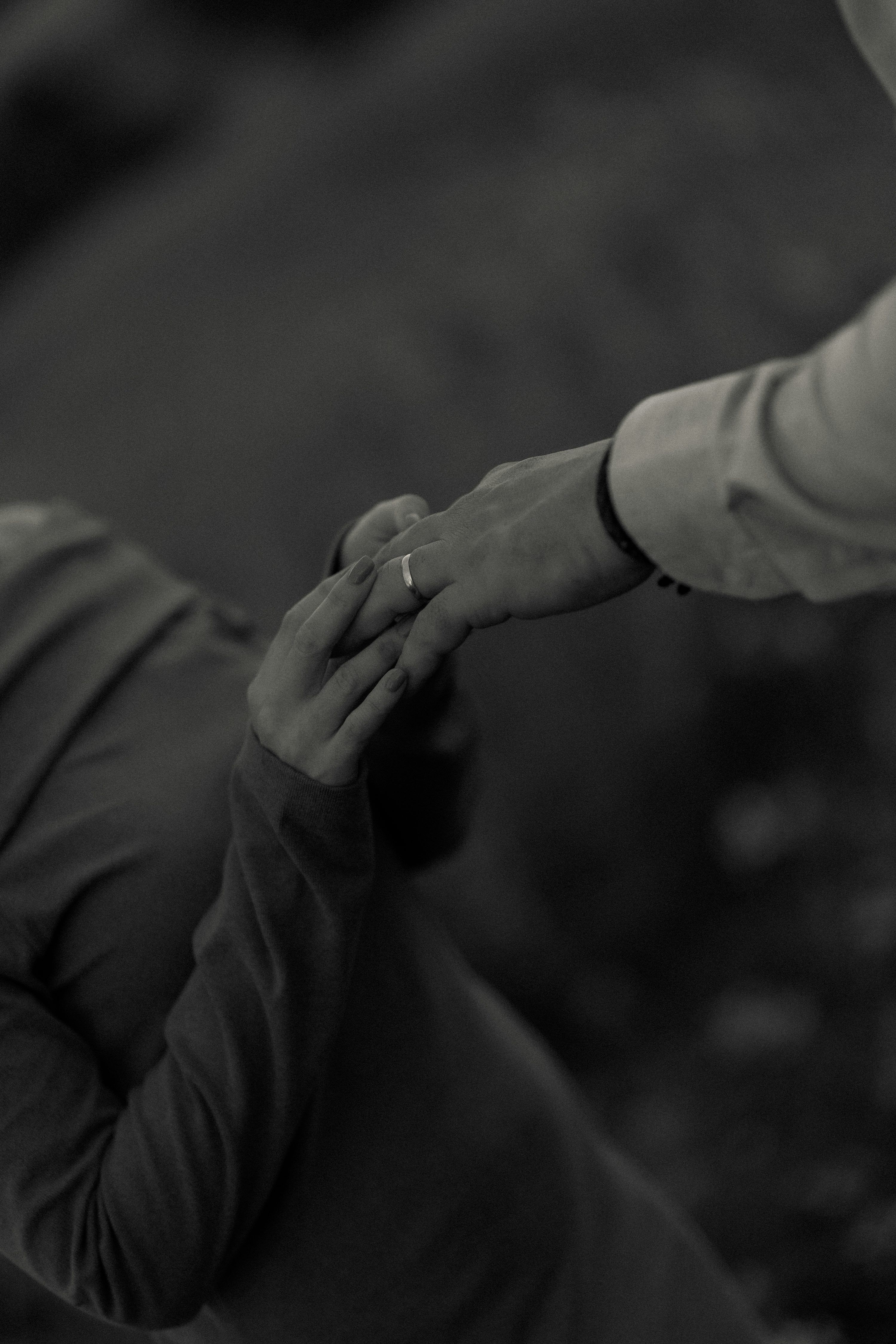 3000x4500 Hands touching, one with a ring