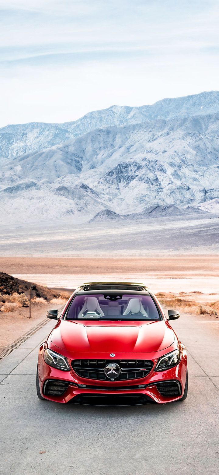 720x1560 Red Mercedes parked on the street wallpaper