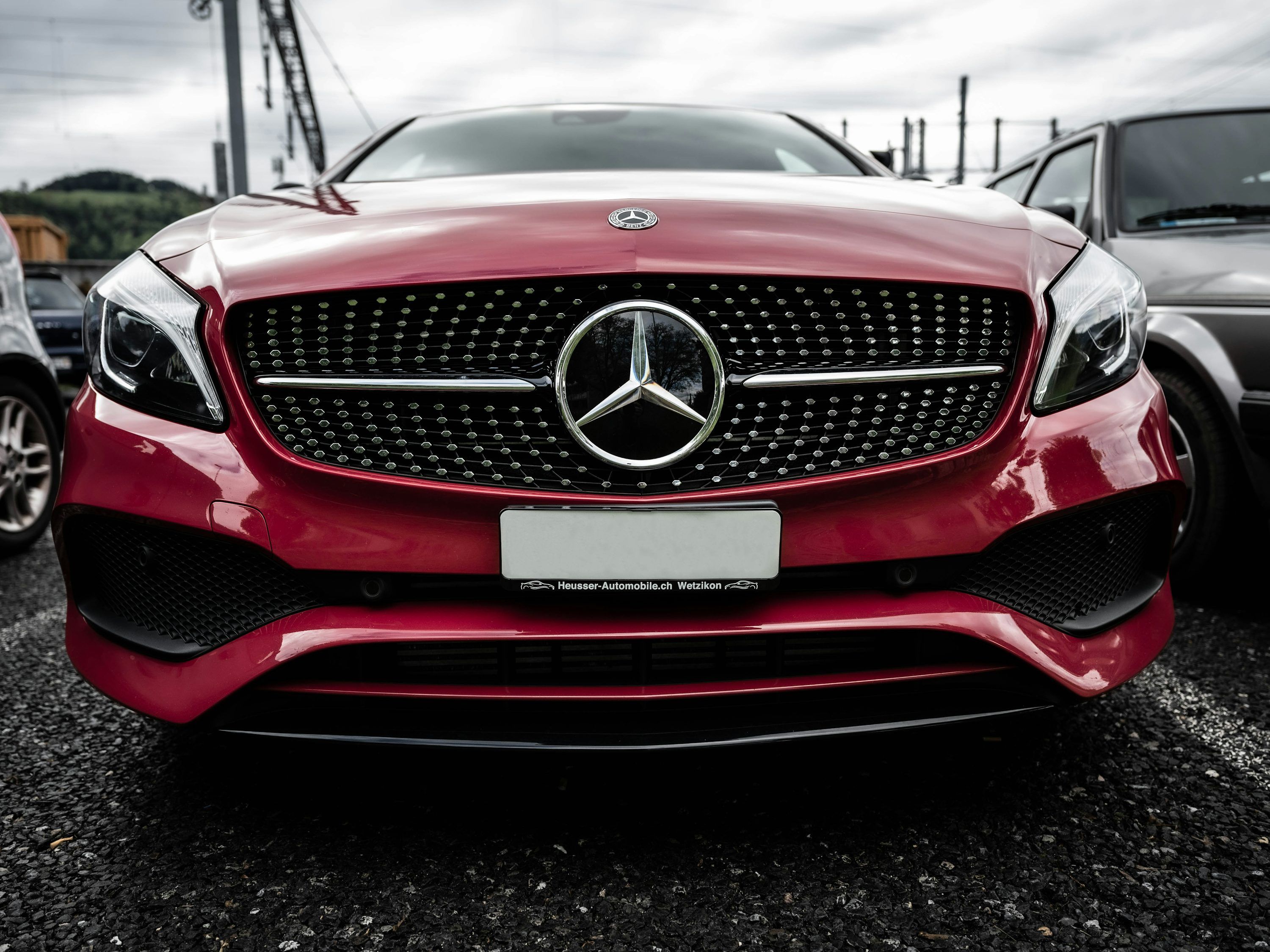 3000x2250 Red mercedes benz car on road